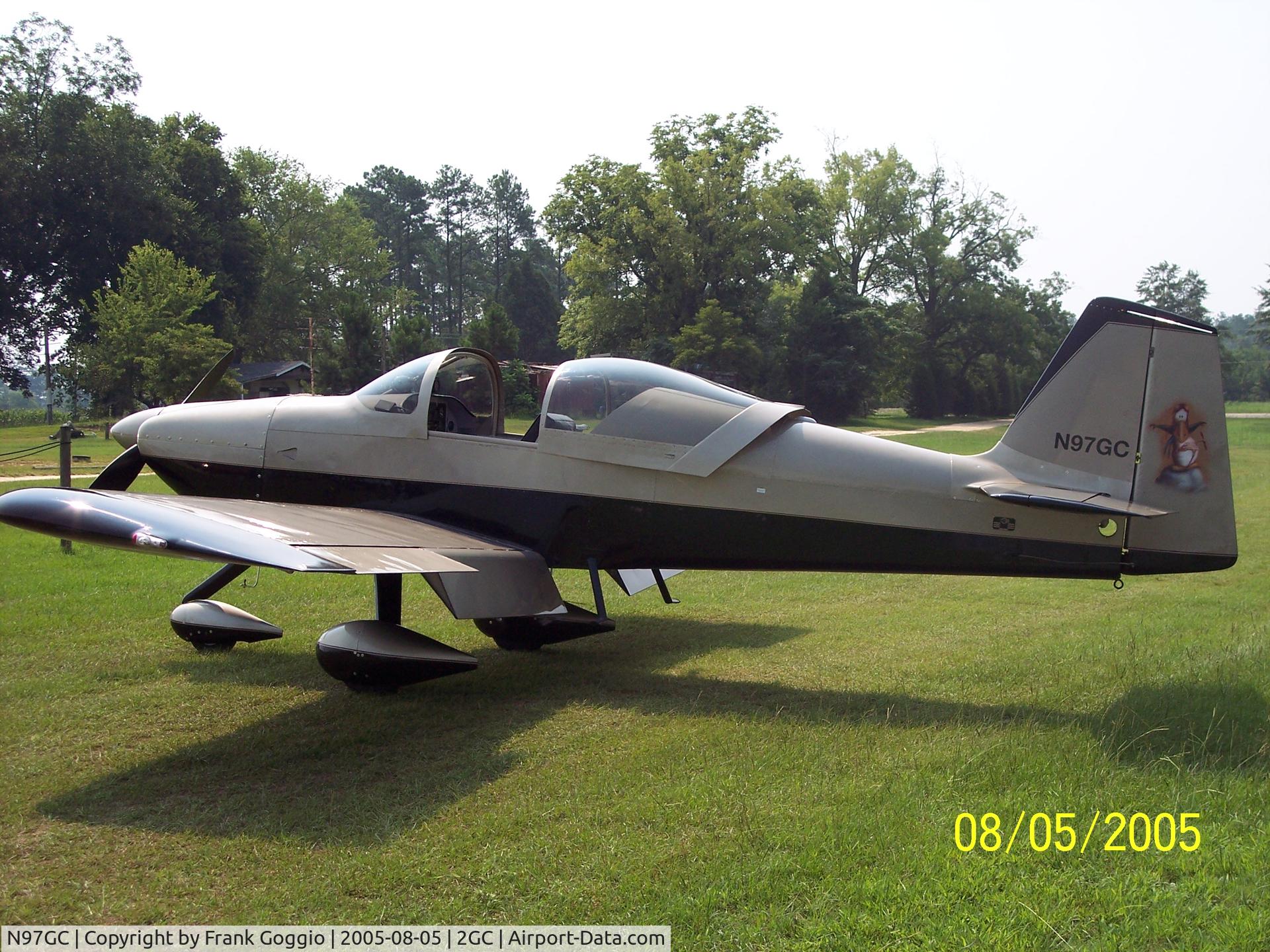 N97GC, Vans RV-6A C/N 25611, Black & Gold RV6-A with cartoon character 'Opus' on tail