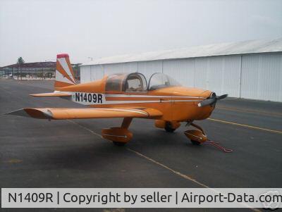 N1409R, 1974 Grumman American AA-1B Trainer C/N AA1B-0509, Missing one wing after being hit by stray Cherokee on ramp.