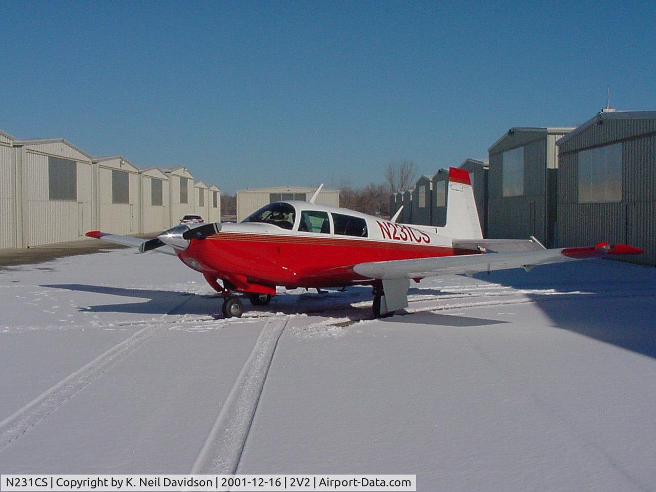 N231CS, 1979 Mooney M20K C/N 25-0133, Mooney N231CS on the snow covered ramp in Longmont
