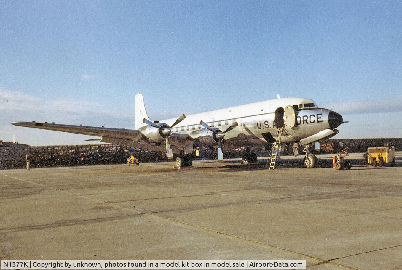 N1377K, 1953 Douglas C-118A Liftmaster (DC-6A) C/N 44596, color photo ca. 1967 per date on back of print