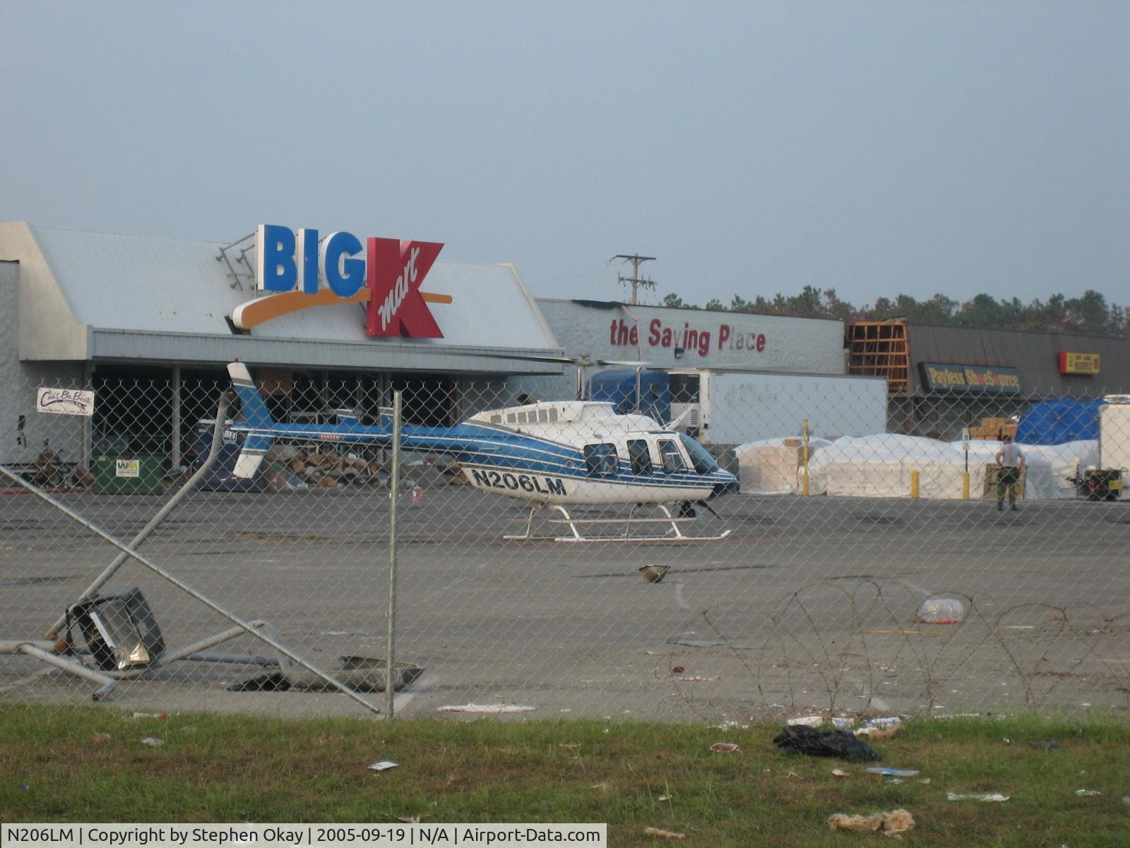 N206LM, 2000 Bell 206L-4 LongRanger IV LongRanger C/N 52243, Photo taken during Katrina Relief Operations, taking off from NC SMAT II temporary pad, Bay St. Louis MS.