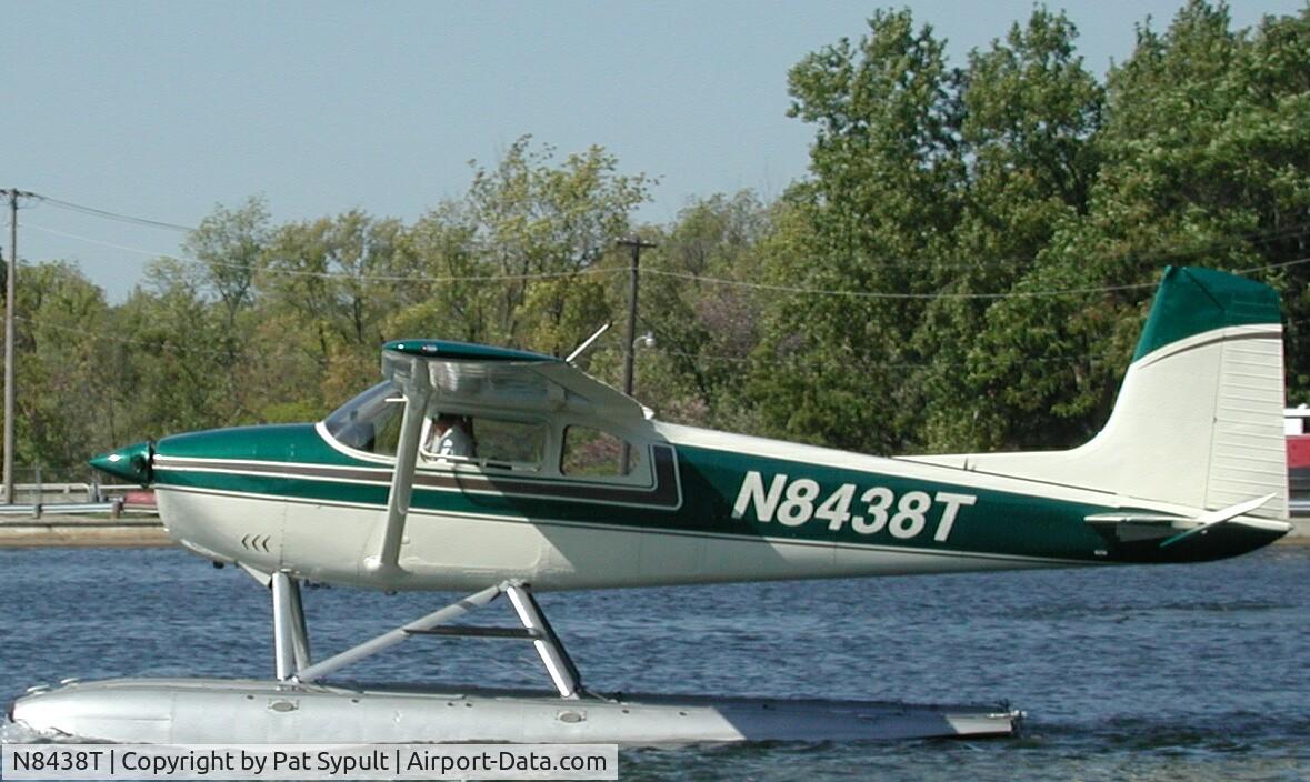 N8438T, 1959 Cessna 182B Skylane C/N 52338, Taking off from Maple Lake Paw Paw Michigan
