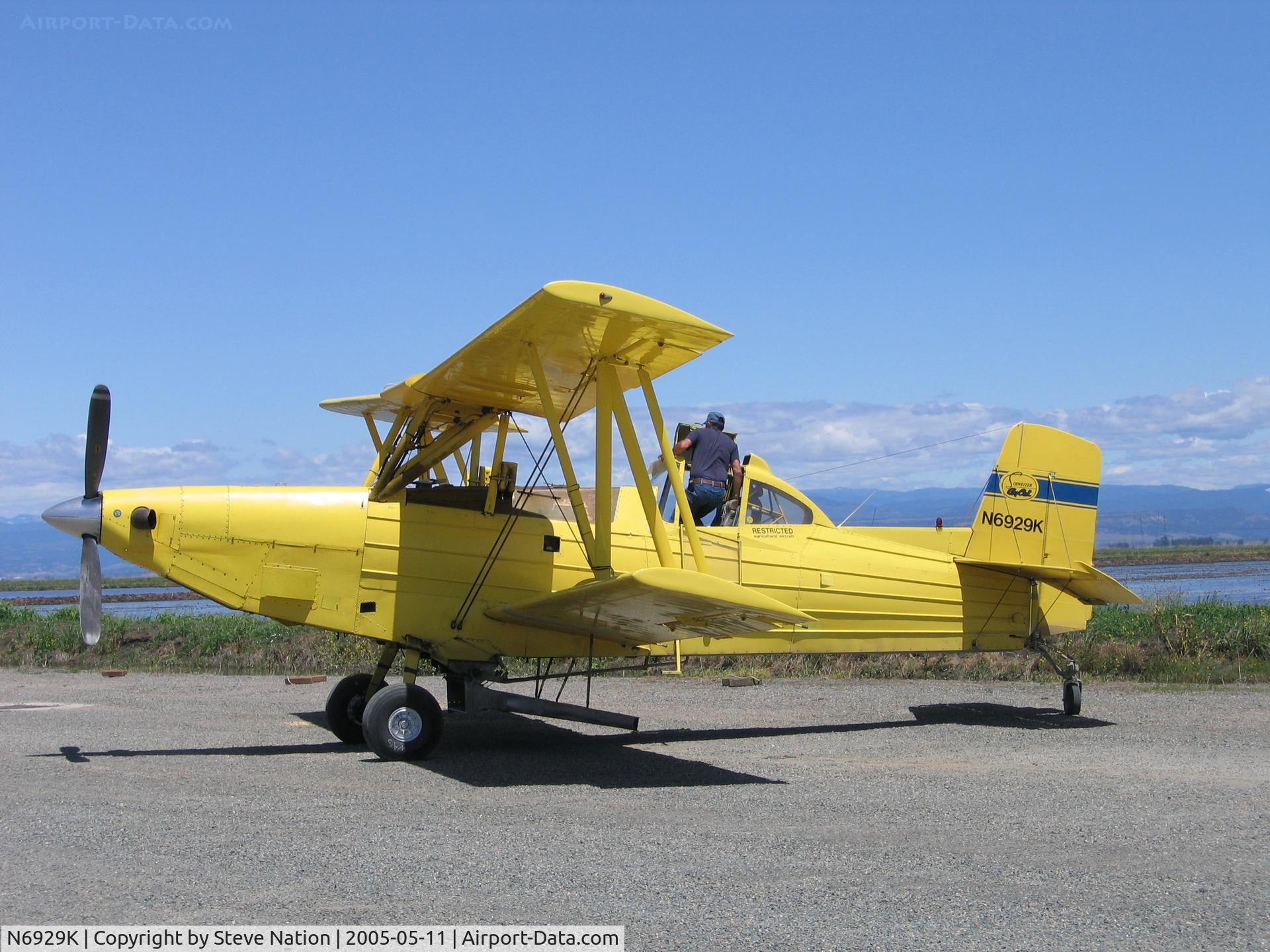 N6929K, 1975 Schweizer G-164B Ag-Cat D C/N 3D, Williams Air Service Ag-Cat during rice seed planting flights near Biggs, CA airstrip