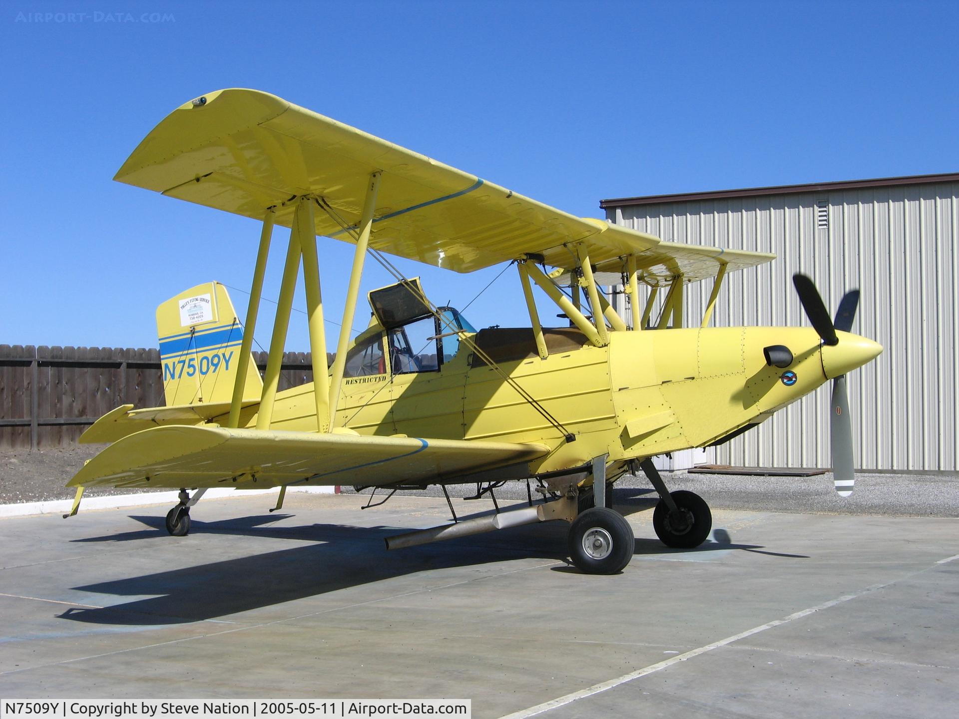 N7509Y, 1992 Schweizer Aircraft Corp G-164B-20T C/N 830B, Tolle's Flying Service Ag-Cat between rice seed planting flights at airstrip just N of Robbins, CA