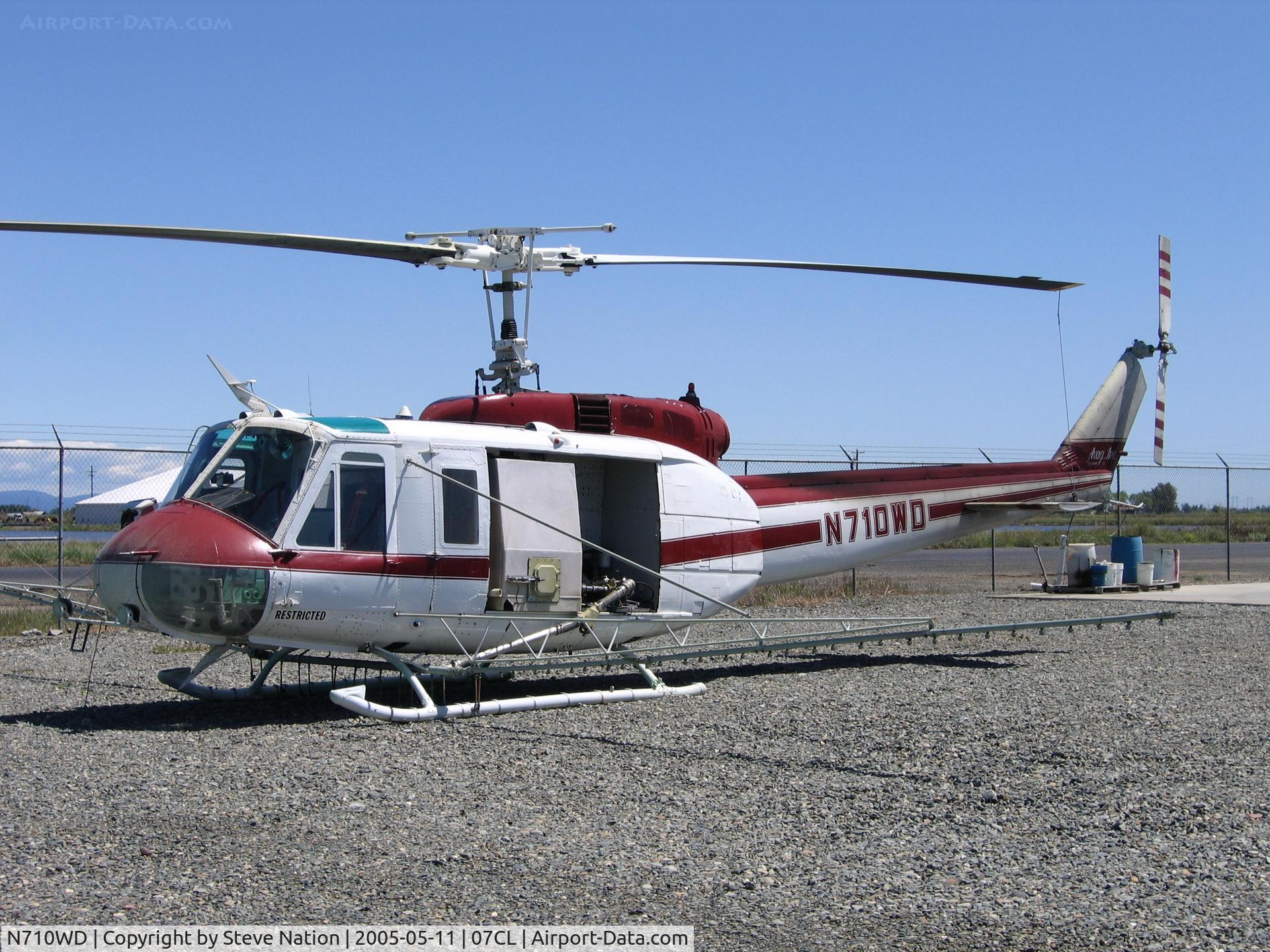 N710WD, Bell UH-1H Iroquois C/N 4805, AVAG Huey rigged for spraying at their airstrip W of Richvale, CA. Sustained substantial damage on 2006-04-01 when pilot lost control during spray run and hit the ground.  Pilot uninjured.