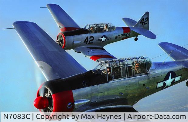 N7083C, 1943 North American SNJ-4 Texan C/N 88-14047, 7083C in Foreground