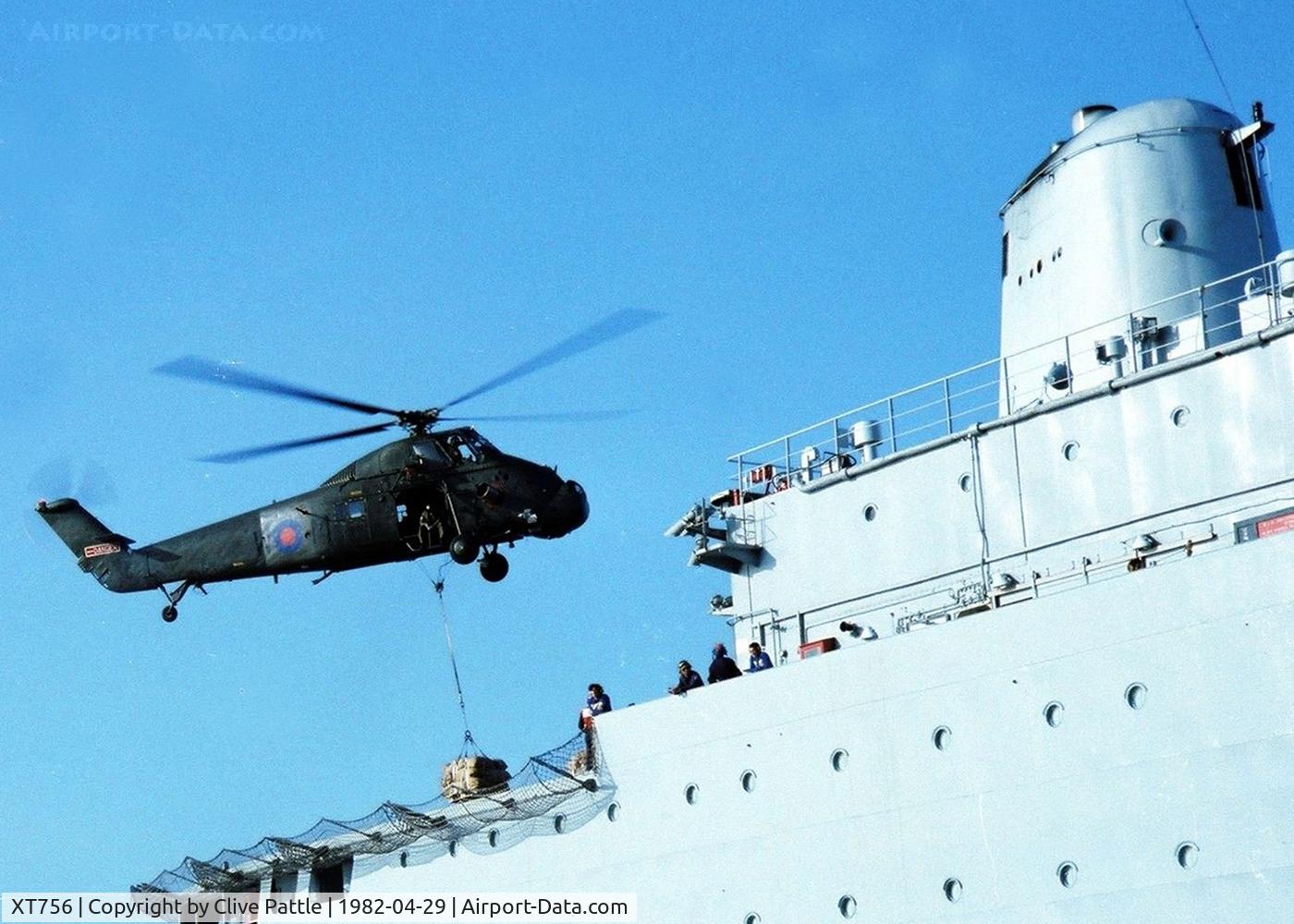 XT756, 1966 Westland Wessex HU.5 C/N WA478, Pictured during the Falklands War, coded W-M of 848 NAS, carrying out a 'Vertrep' on RFA Resource whilst the ship was alongside RFA Stromness then off Ascension Island heading south.