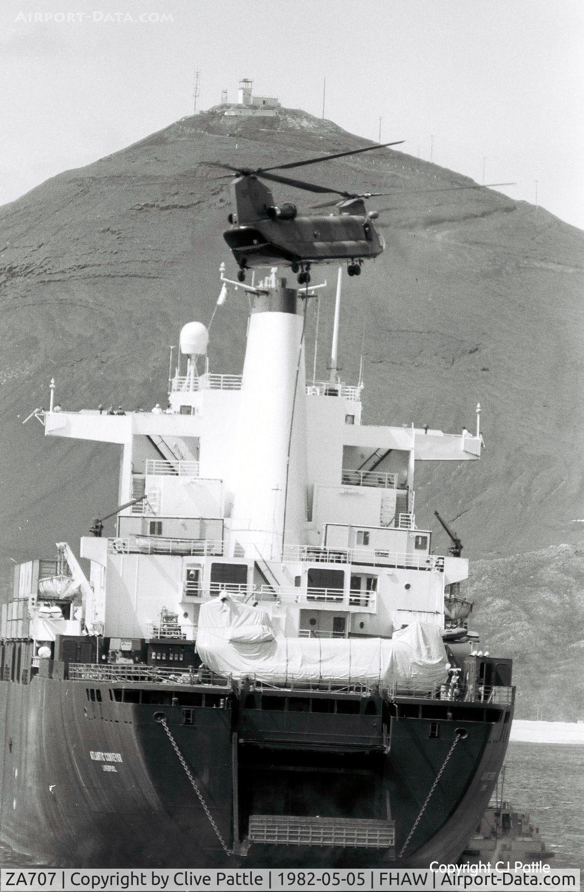 ZA707, 1981 Boeing Vertol Chinook HC.1 C/N M/A019/B-837/M7025, coded 'BP' of 18 Sqn RAF pictured hovering over the ill-fated MV Atlantic Conveyor off Ascension Island enroute to the Falklands War. n.b the cocooned Chinook on the aft of the ship. It along with other helis were lost when the ship sank after an exocet a