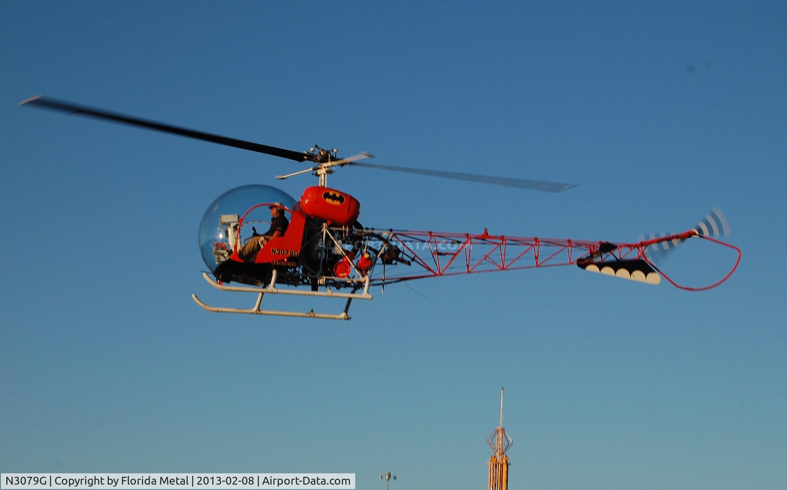 N3079G, 1964 Bell 47G-3B-1 Sioux C/N 2921, Bat Copter giving rides at the Florida State Fair in Tampa.  Didn't have a camera so I had to borrow a (gulp) Nikon for this shot