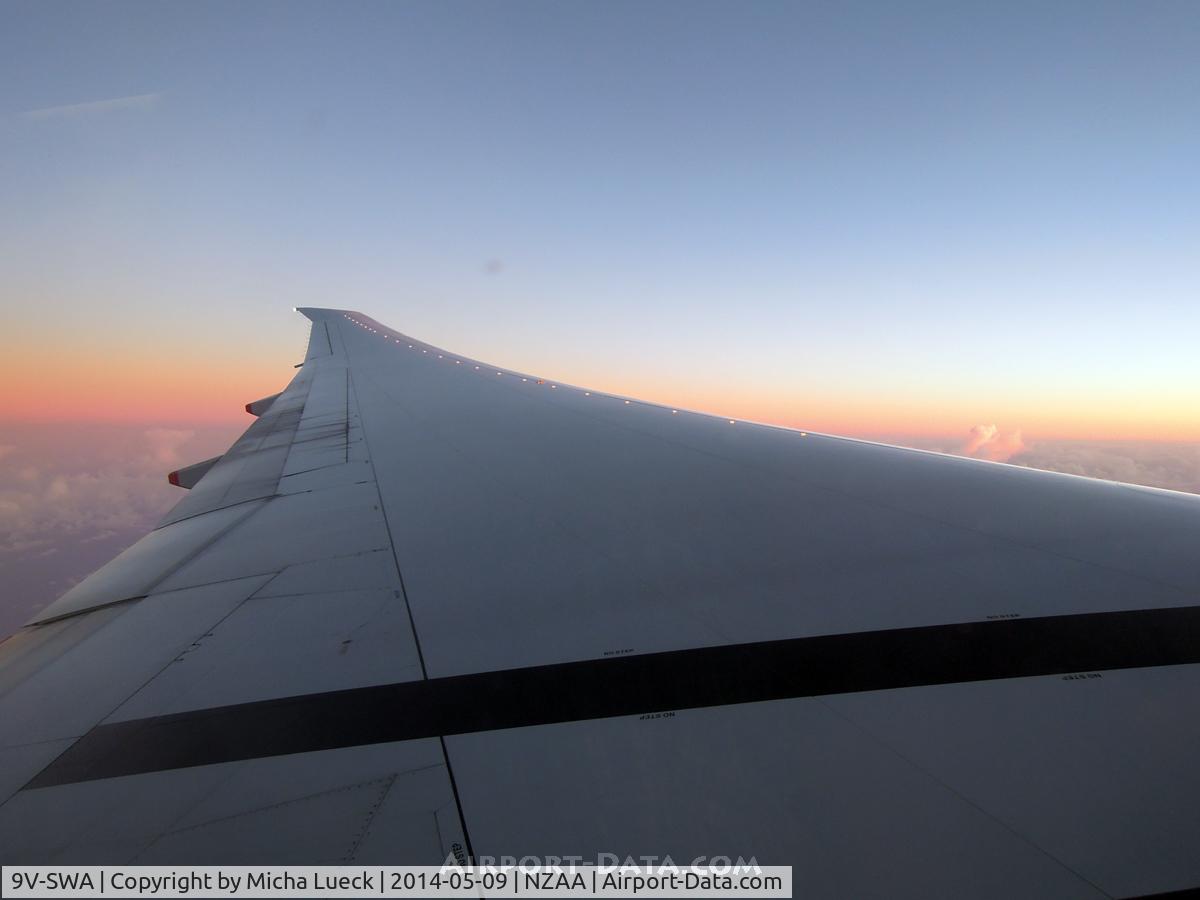 9V-SWA, 2006 Boeing 777-312/ER C/N 34568, Last light of the day on the 4-hour delayed flight AKL-SIN
