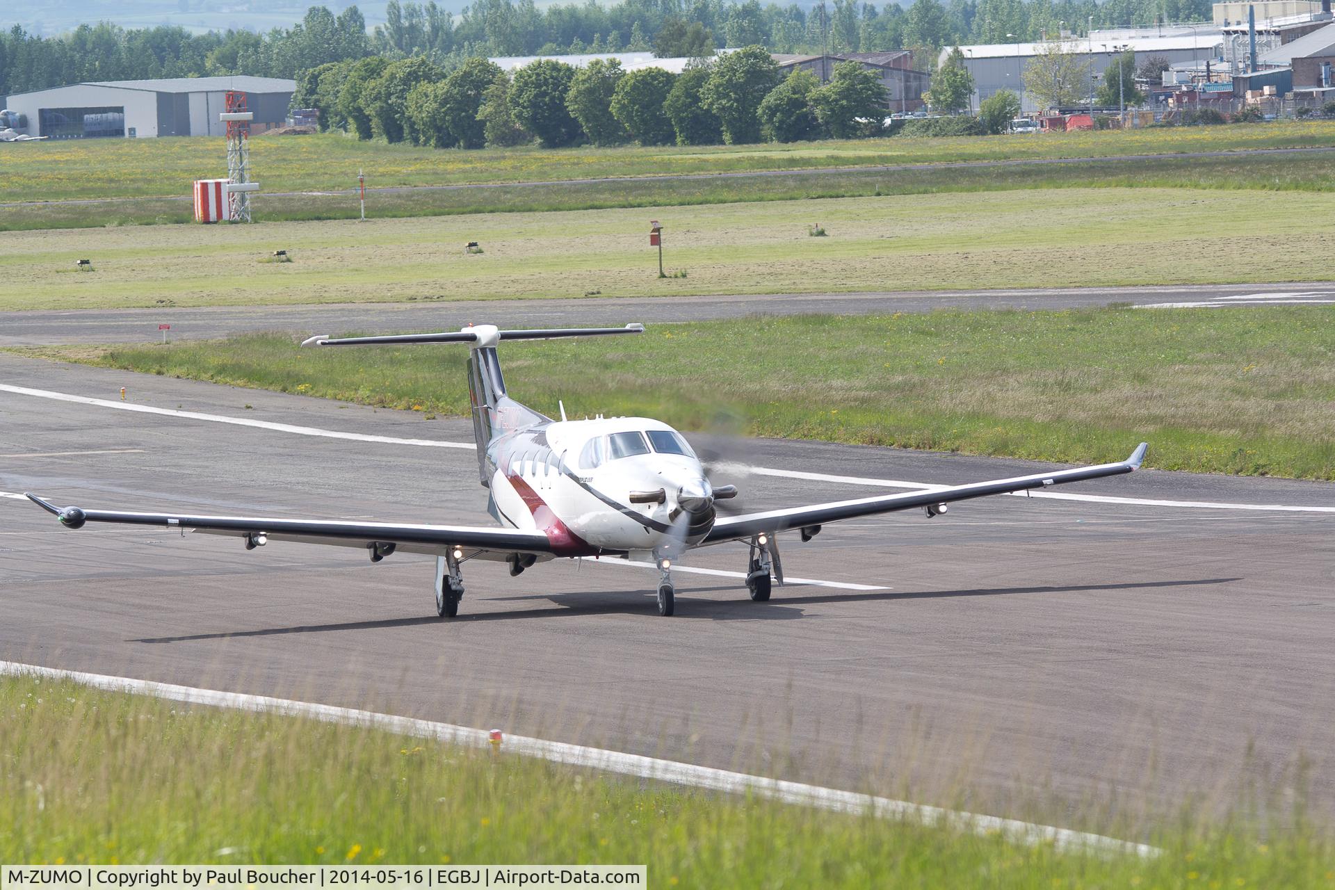 M-ZUMO, 2006 Pilatus PC-12/47 C/N 732, taxiing at Gloucestershire airport