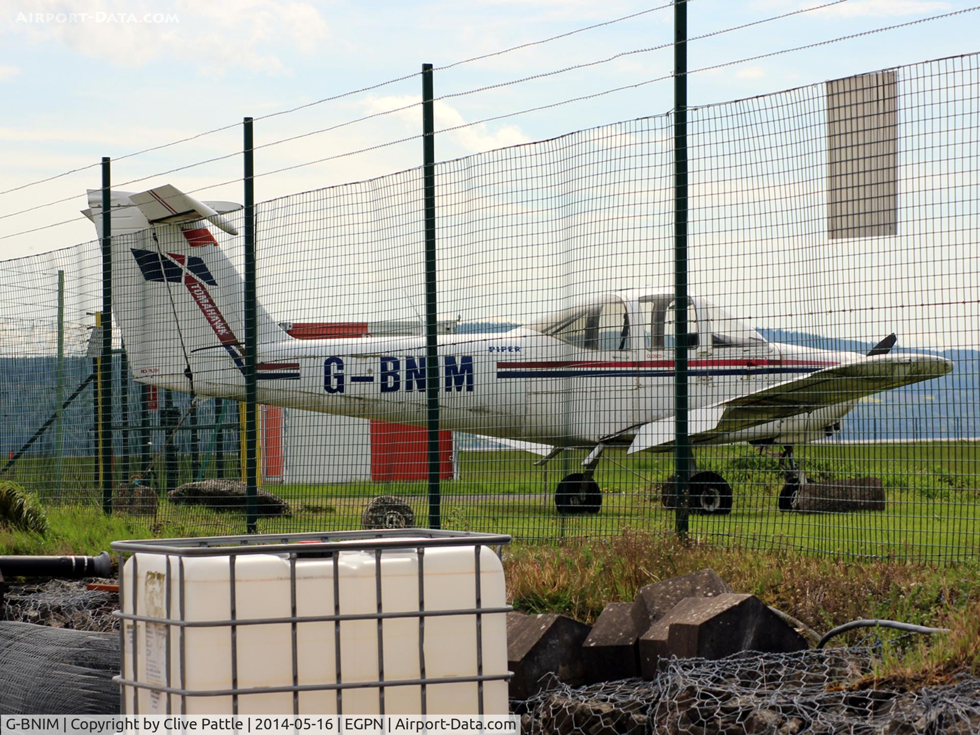 G-BNIM, 1978 Piper PA-38-112 Tomahawk Tomahawk C/N 38-78A0148, Tomahawk G-BNIM awaits its fate in the aircraft cemetary at Dundee Riverside EGPN