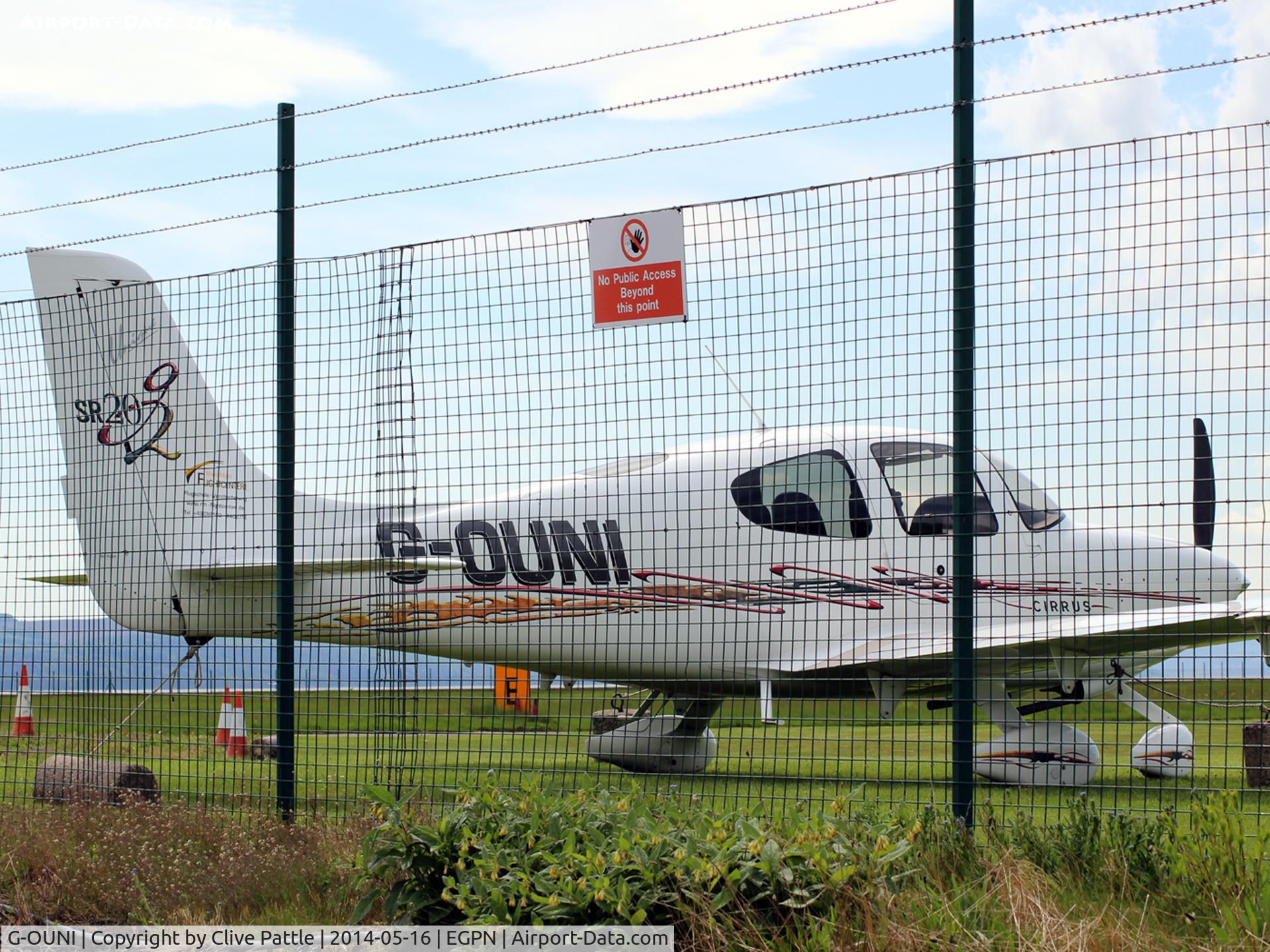 G-OUNI, 2006 Cirrus SR20 G2 C/N 1705, Spotters can get real close without crossng the boundary ....