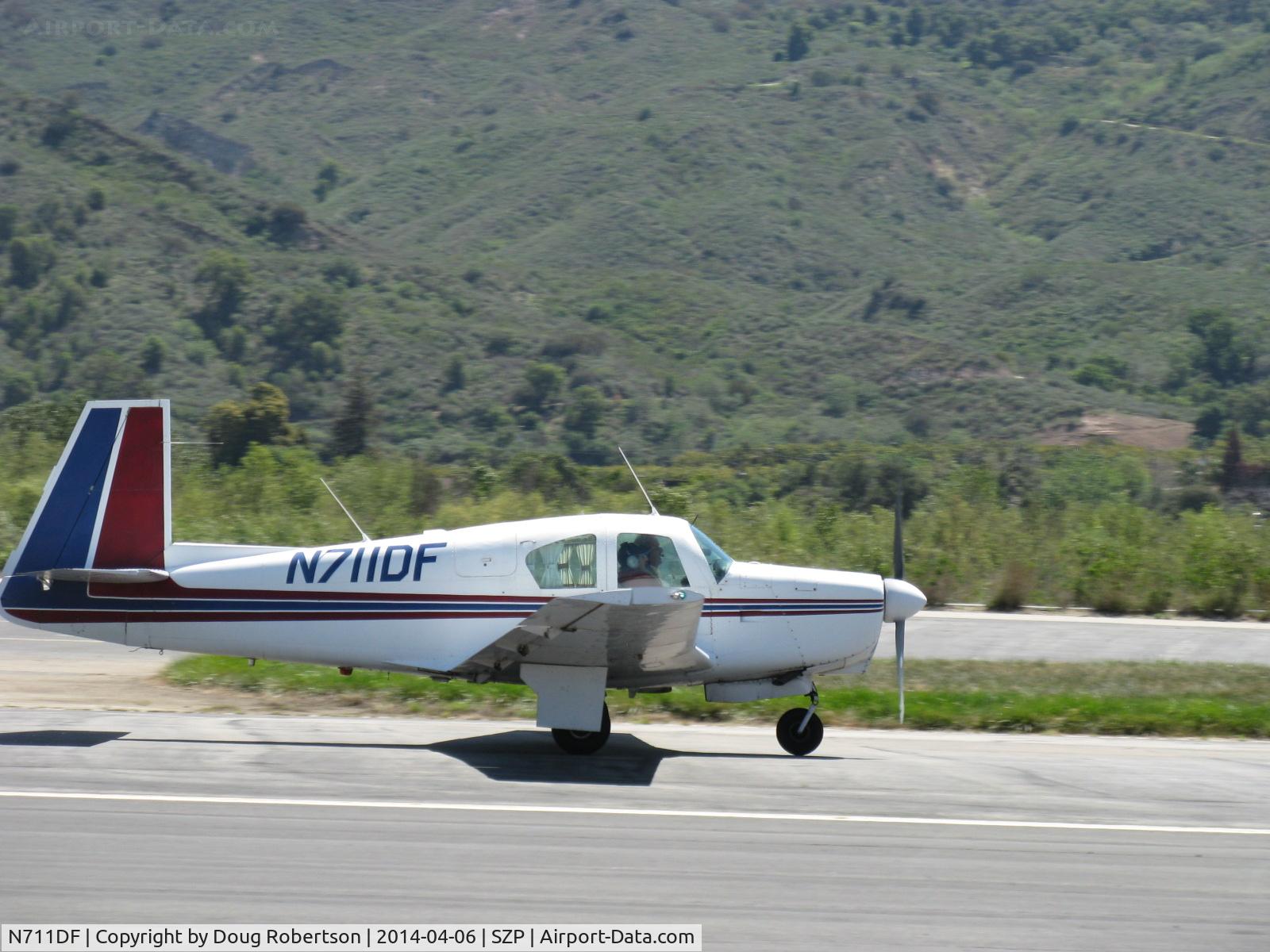 N711DF, 1963 Mooney M20C Ranger C/N 2532, 1963 Mooney M20C, Lycoming O&VO-360 180 Hp, landing roll Rwy 22