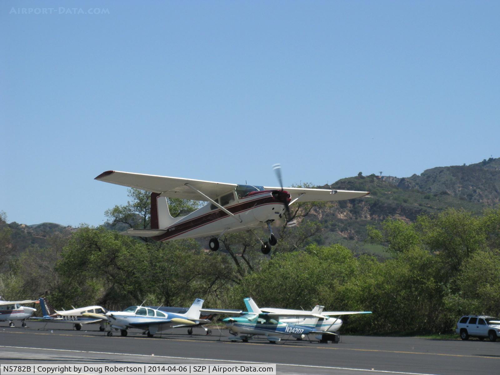 N5782B, 1956 Cessna 182 Skylane C/N 33782, 1956 Cessna 182 SKYLANE, Continental O-470-S 230 Hp, takeoff climb Rwy 22