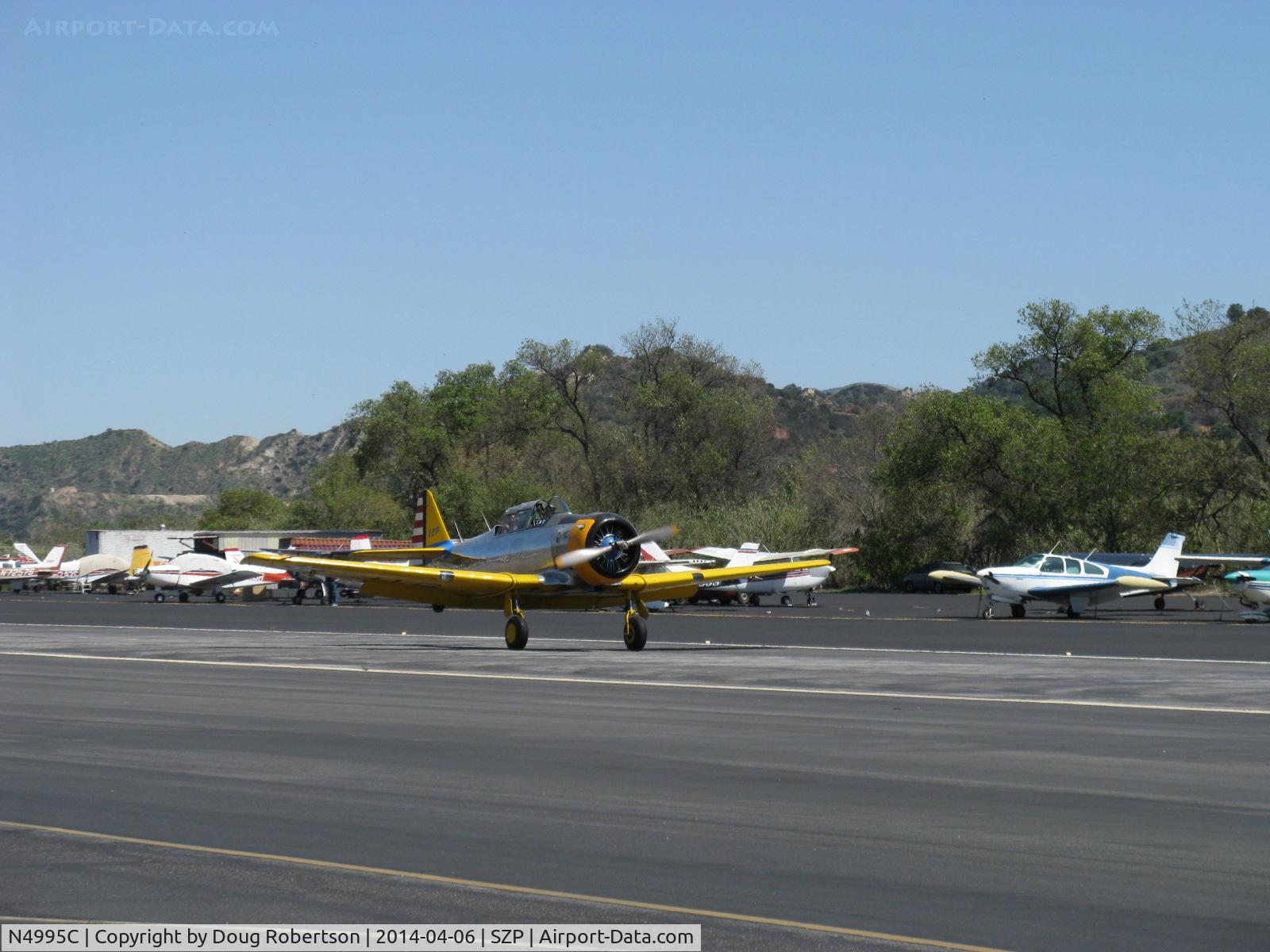 N4995C, 1949 North American T-6G Texan C/N 168-481, 1949 North American T-6G TEXAN 'Thirsty Girl', 1949 factory reman, P&W R-1340 Wasp 600 Hp radial, Experimental class warbird, takeoff roll Rwy 22