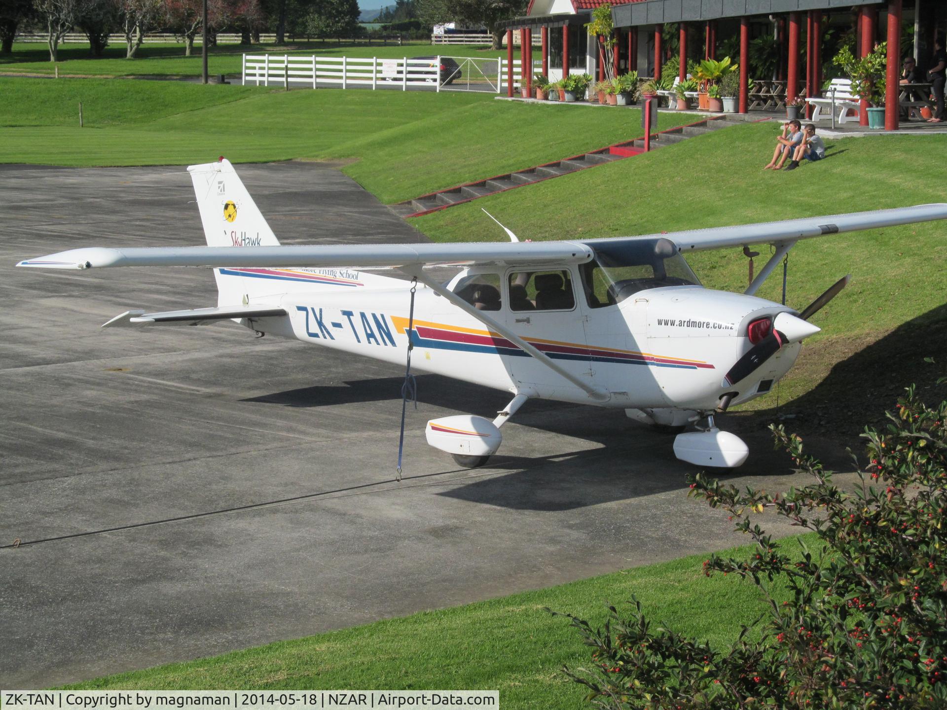 ZK-TAN, Cessna 172R C/N 17281089, Sitting on grass bank getting a tan!