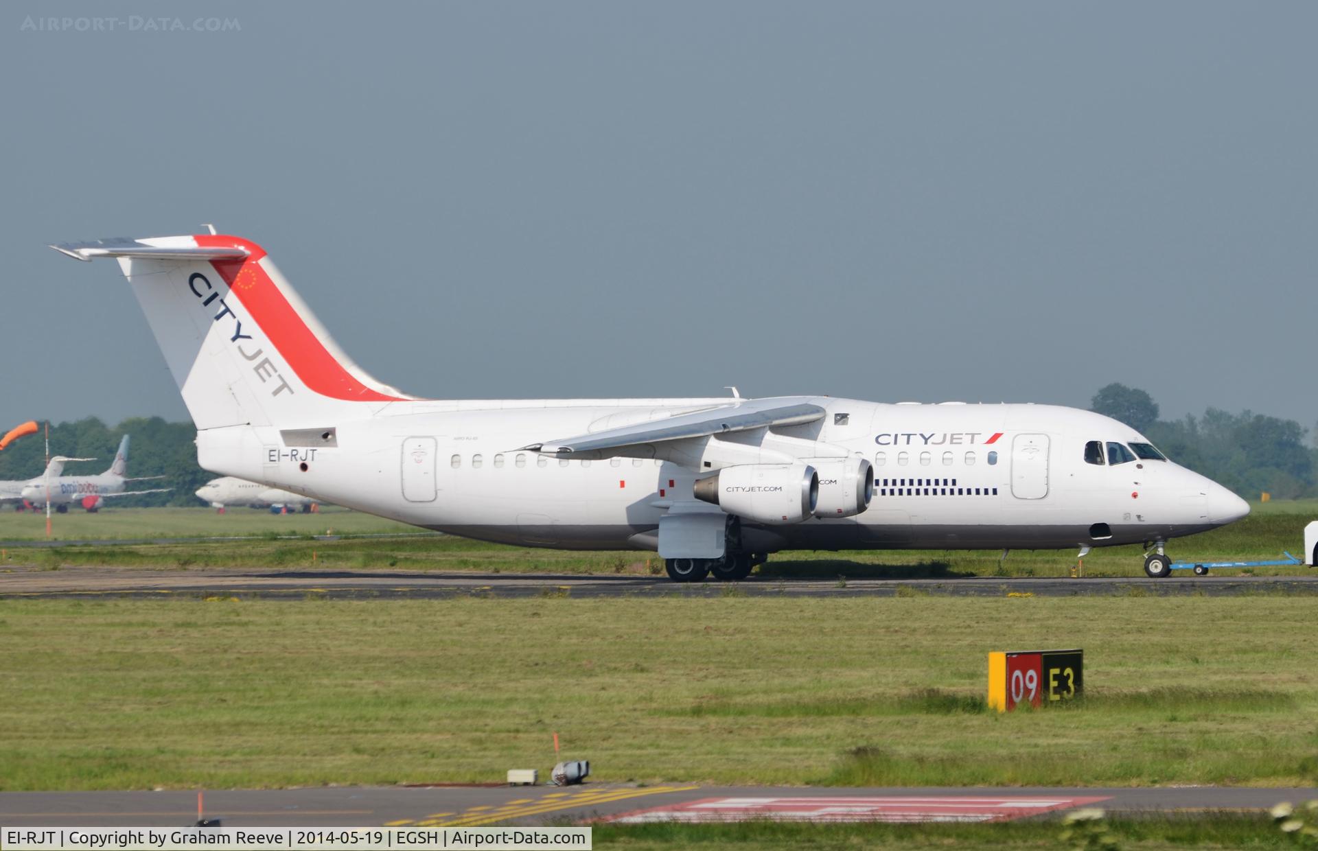 EI-RJT, 2000 British Aerospace Avro 146-RJ85A C/N E2366, Under tow at Norwich.