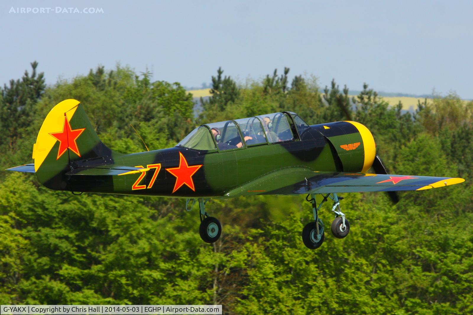 G-YAKX, 1991 Yakovlev (Aerostar) Yak-52 C/N 9111307, at the 2014 Microlight Trade Fair, Popham