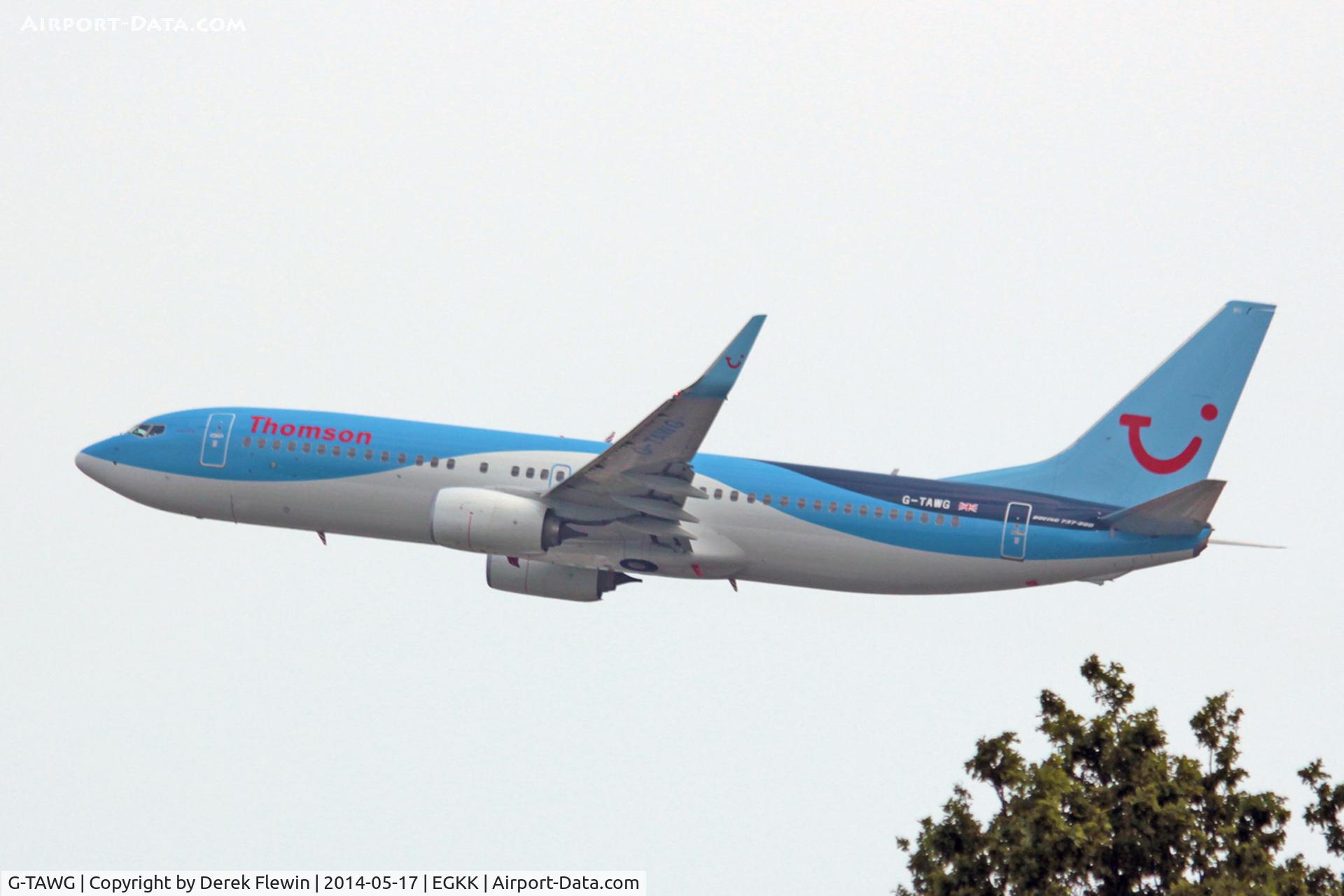 G-TAWG, 2012 Boeing 737-8K5 C/N 37266, Seen pulling out from runway 26R at EGKK.