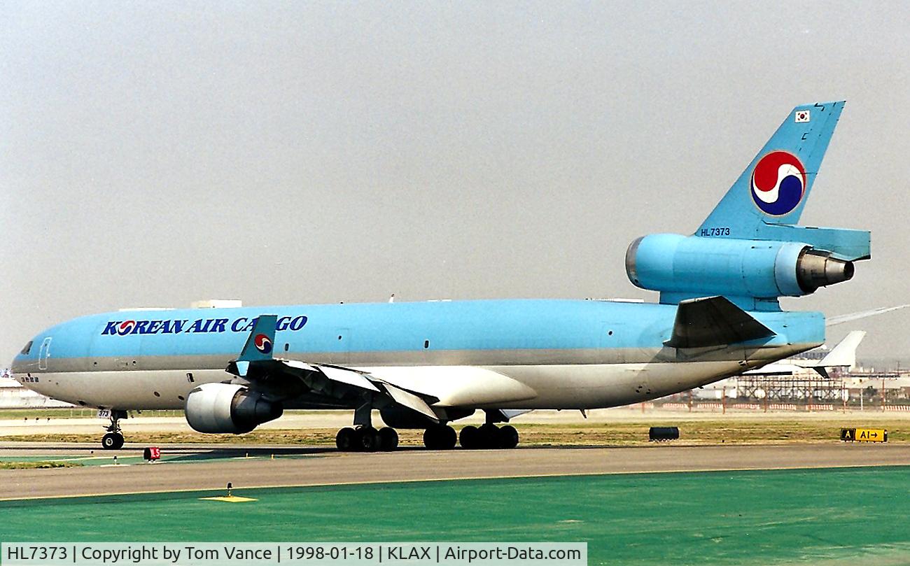 HL7373, McDonnell Douglas MD-11F C/N 48409, KLAX - Korean Cargo holding short of 25L at LAX.