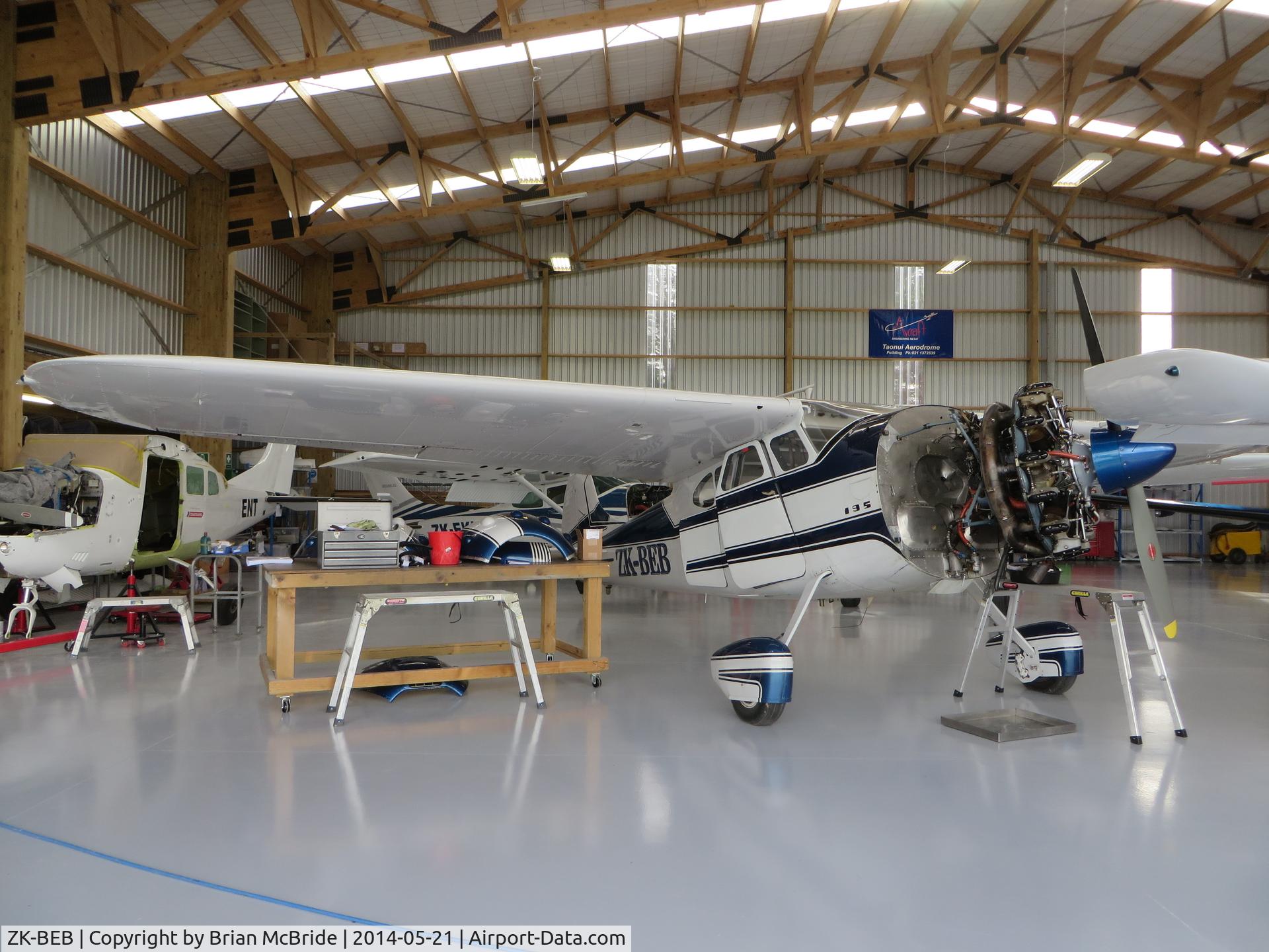 ZK-BEB, 1949 Cessna 195 C/N 7410, Cessna 195. ZK-BEB cn 7410. B B Aviation. Engine maintenance @ Avcraft Engineering NZ Ltd. Taonui Aerodrome, Feilding, New Zealand. Image © Brian McBride. 21 May 2014