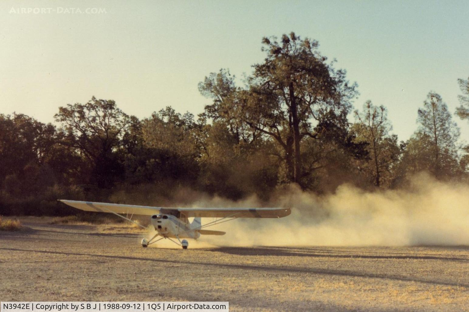 N3942E, 1947 Aeronca 11BC Chief C/N 11BC-23, 42E departing Lake Pillsbury,Ca in 1987.Visible proof of what the mighty thrust of 85 horses looks like!