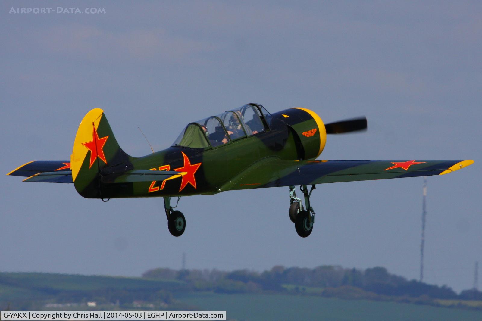 G-YAKX, 1991 Yakovlev (Aerostar) Yak-52 C/N 9111307, at the 2014 Microlight Trade Fair, Popham