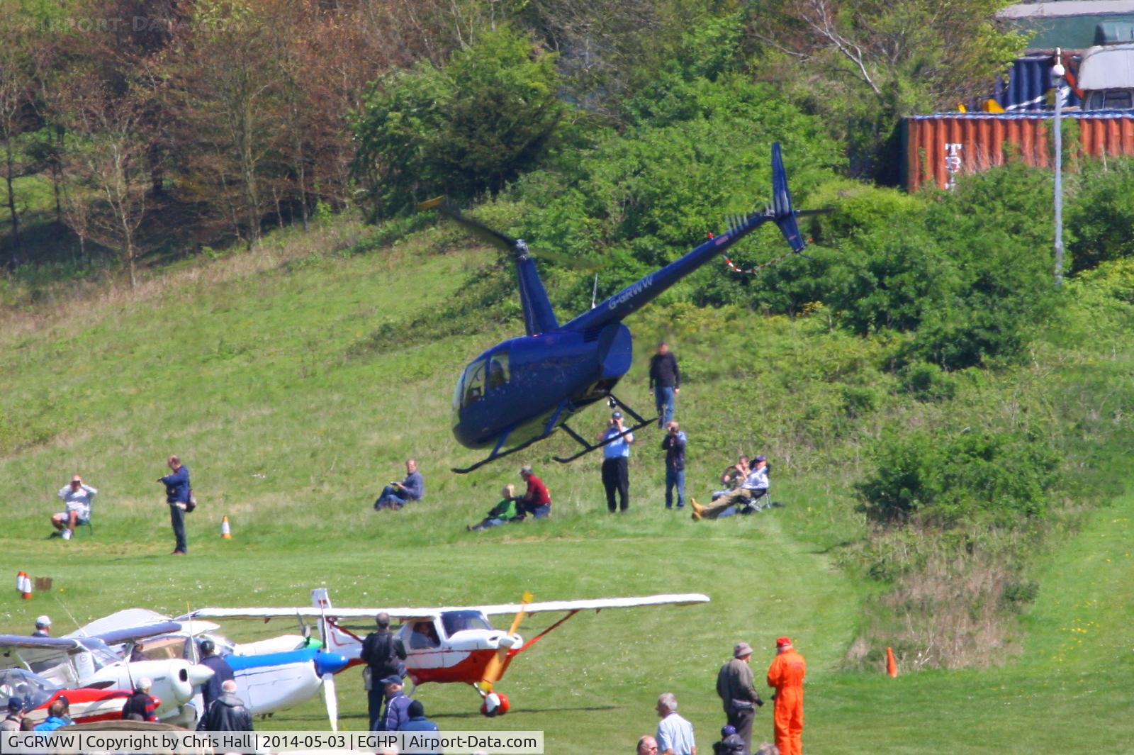 G-GRWW, 2004 Robinson R44 Raven II C/N 10382, at the 2014 Microlight Trade Fair, Popham