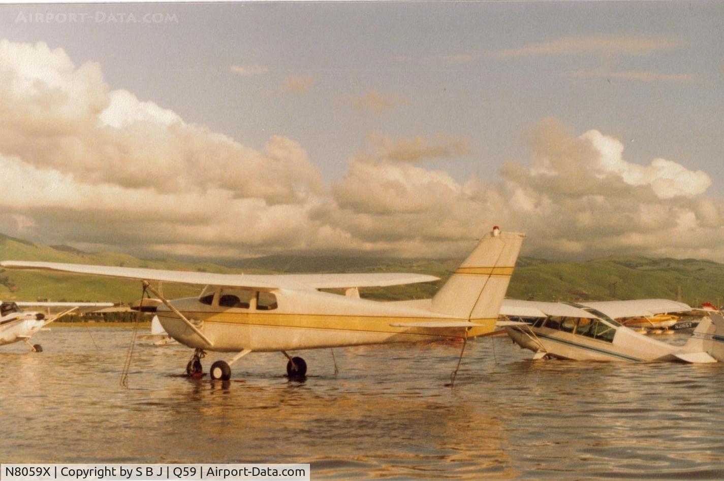 N8059X, 1961 Cessna 172B C/N 17248559, One spring day at the old Fremont airport in calif. This happened every other year or so. It was very good at keeping the dust down. By the way, 59X is sitting on  pallets. Water is 2-3 feet deep.If you didnt move your plane in time, this was next best.