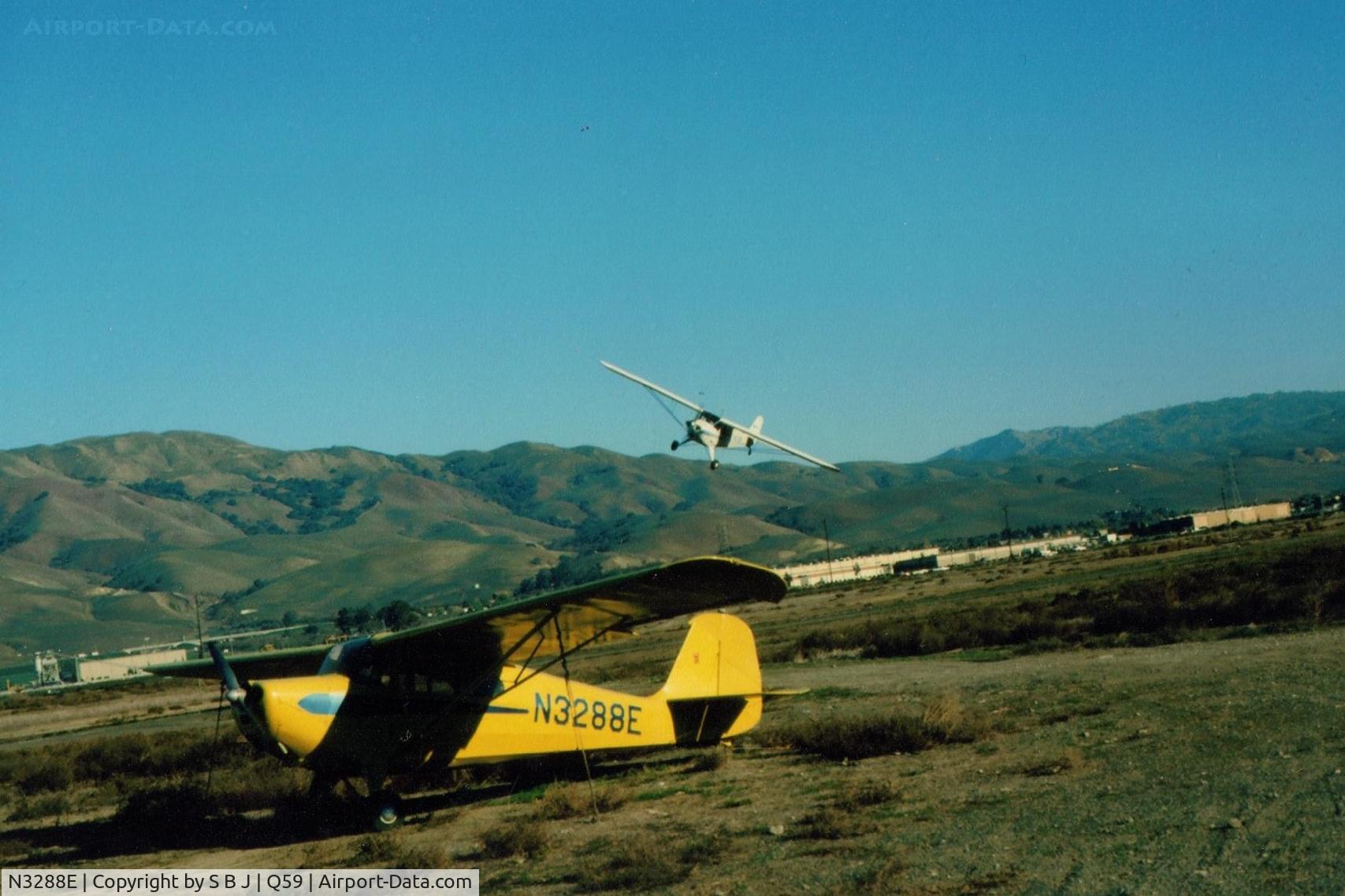 N3288E, 1947 Aeronca 11AC Chief C/N 11AC-1659, 88E when it was based at the Fremont Airport. Taylorcraft 961 is overhead turning crosswind after takeoff in 1976.