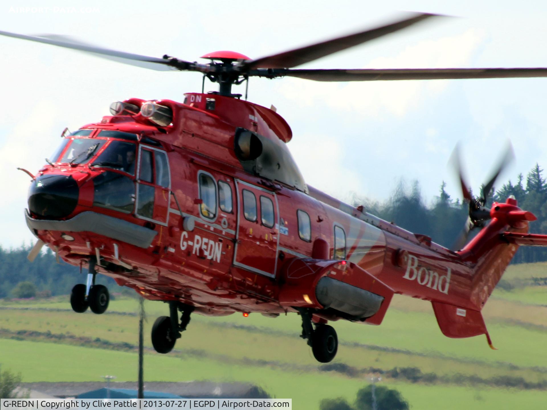 G-REDN, 2004 Eurocopter AS-332L-2 Super Puma C/N 2616, Hover-taxy to the terminal at Aberdeen EGPD
