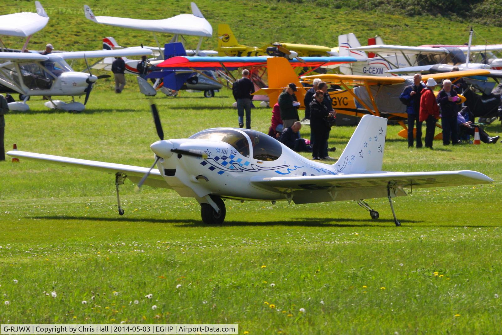 G-RJWX, 2001 Europa XS Monowheel C/N PFA 247-13197, at the 2014 Microlight Trade Fair, Popham