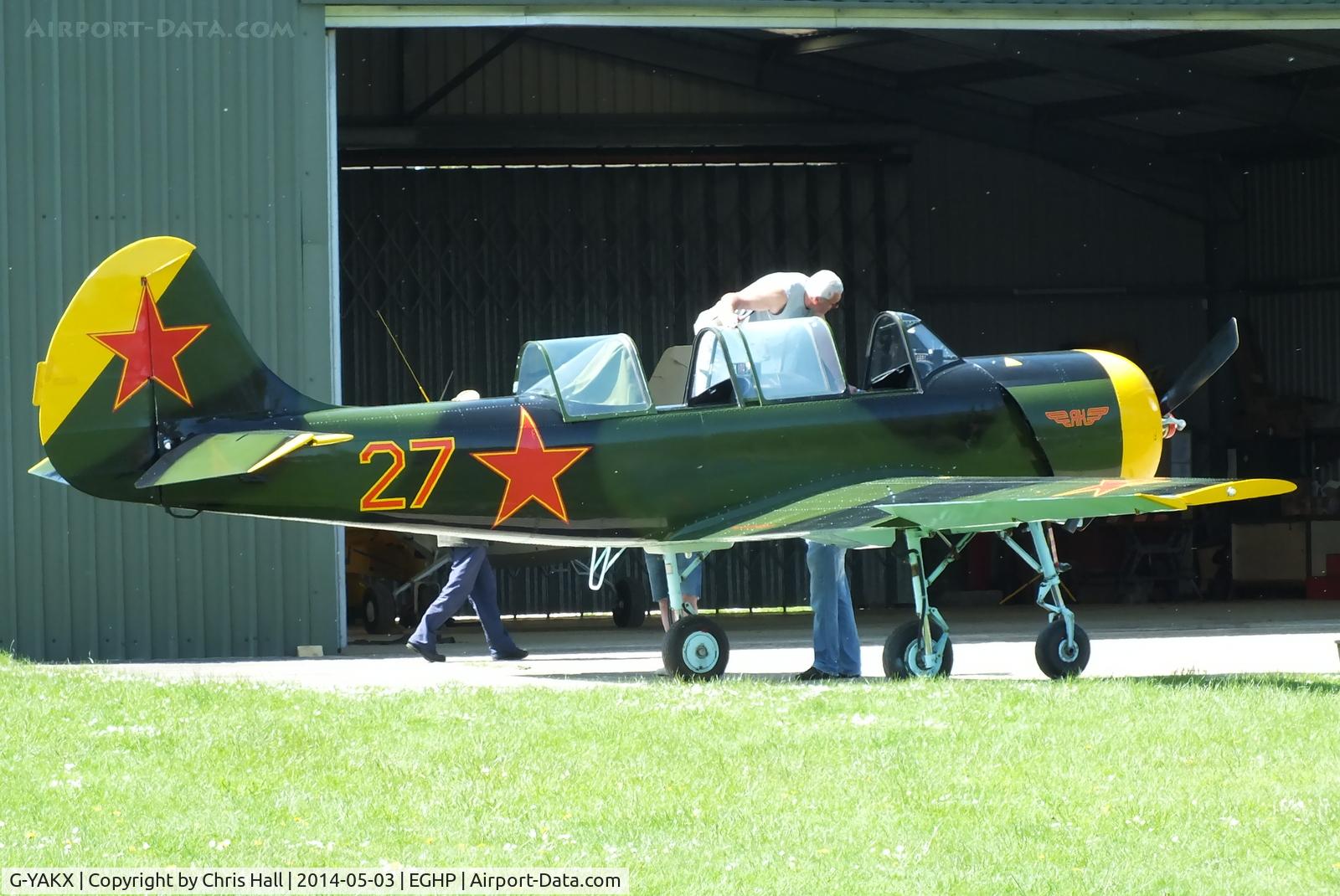 G-YAKX, 1991 Yakovlev (Aerostar) Yak-52 C/N 9111307, at the 2014 Microlight Trade Fair, Popham