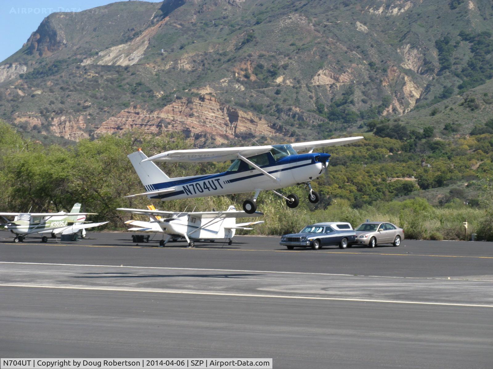 N704UT, 1976 Cessna 150M C/N 15078891, 1976 Cessna 150M, Continental O-200 100 Hp, takeoff climb Rwy 22