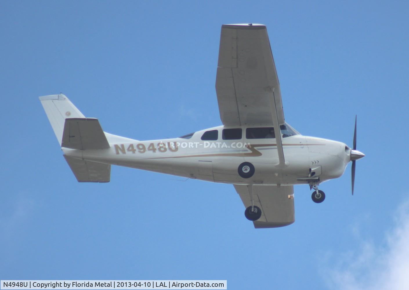 N4948U, 1965 Cessna 210E Centurion C/N 21058648, Cessna 210E departing Sun N Fun