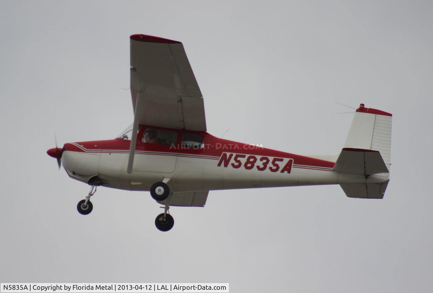 N5835A, 1956 Cessna 172 C/N 28435, Cessna 172 leaving Sun N Fun on a cloudy day