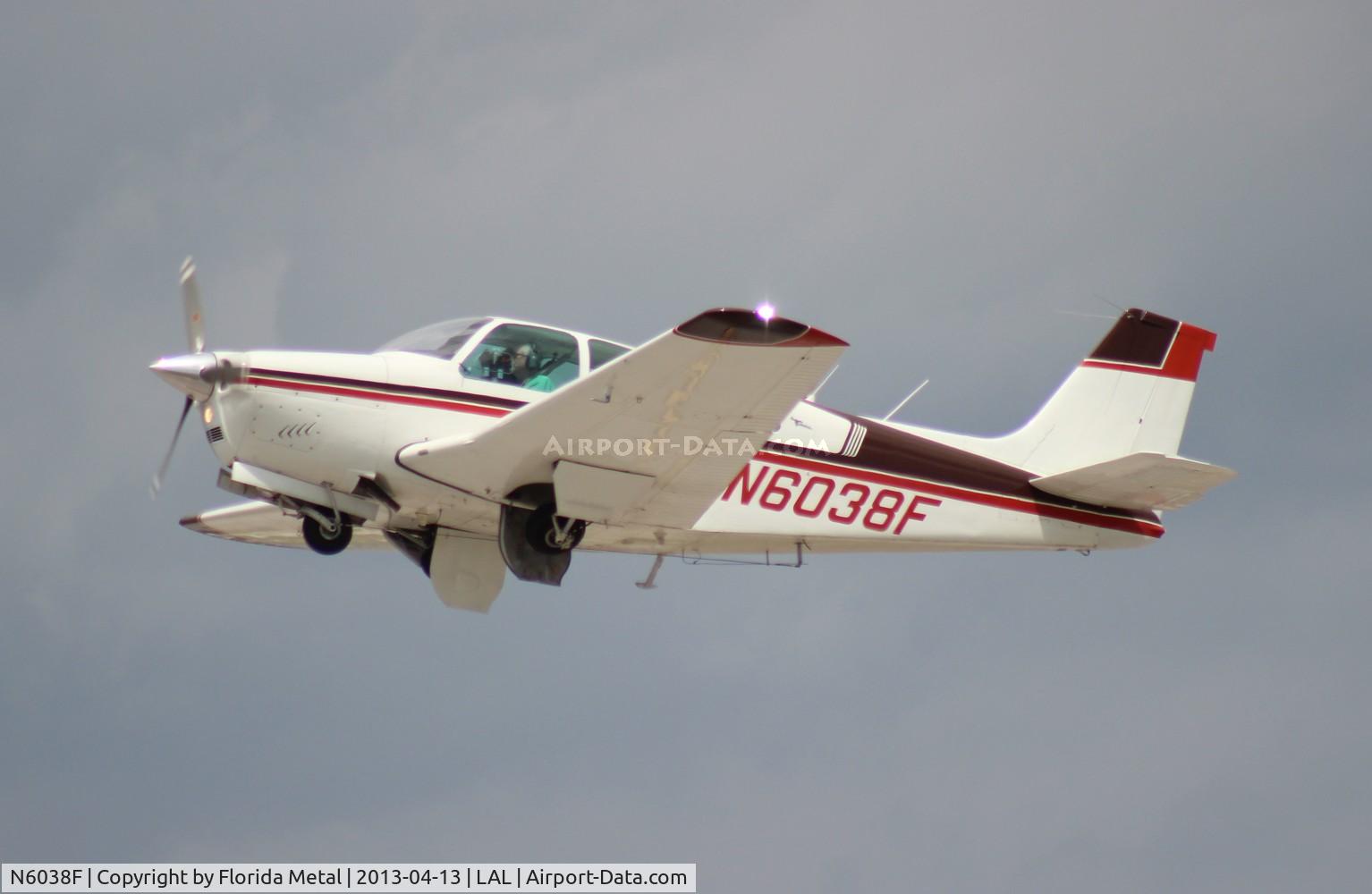 N6038F, 1965 Beech 35-C33 Debonair C/N CD-881, Beech 33 Bonanza leaving Sun N Fun