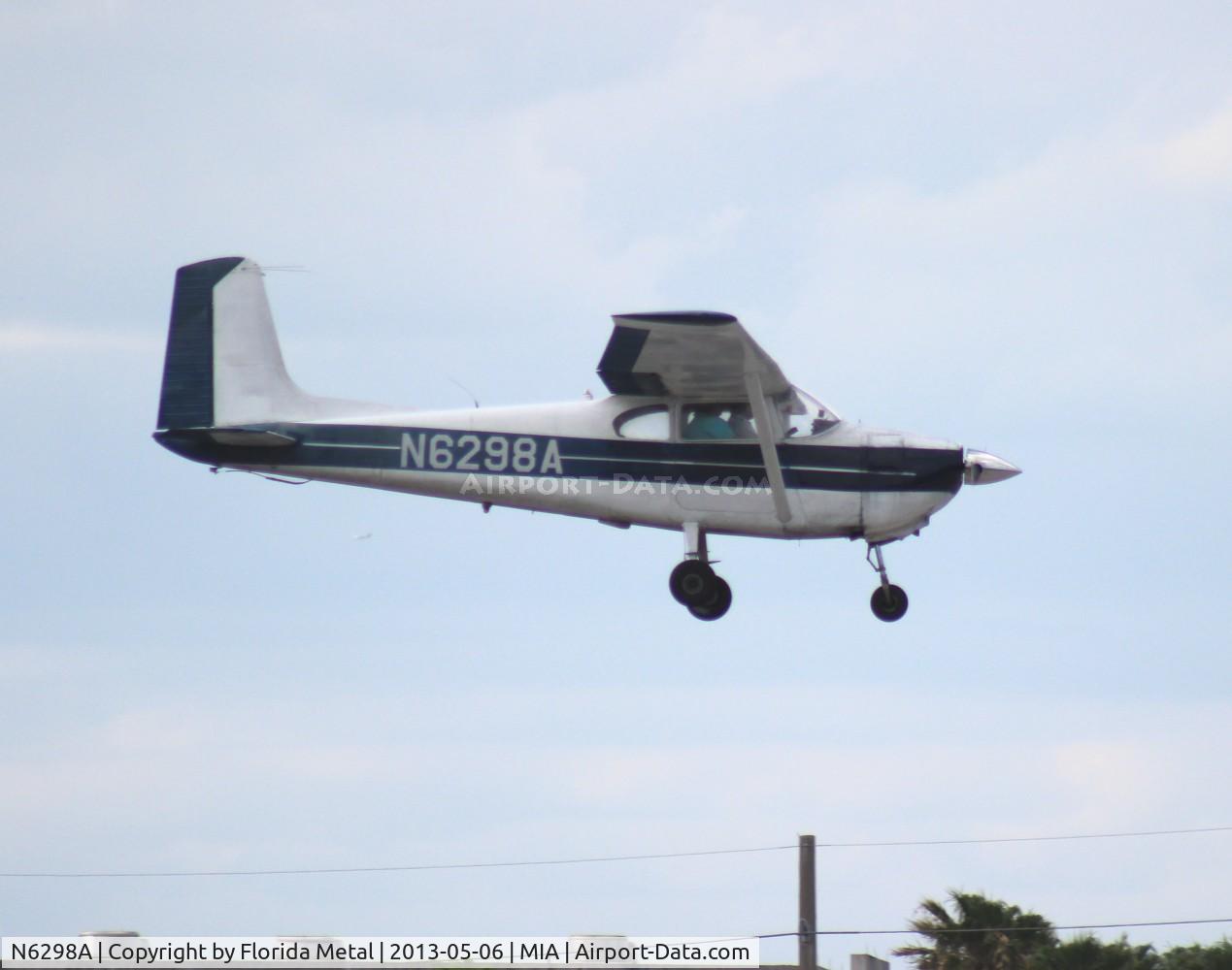 N6298A, 1956 Cessna 182 Skylane C/N 33098, Really strange to see this Cessna 182 land on Runway 9 at MIA.  Its not unusual to see GA aircraft land at MIA, but they usually land on 8L