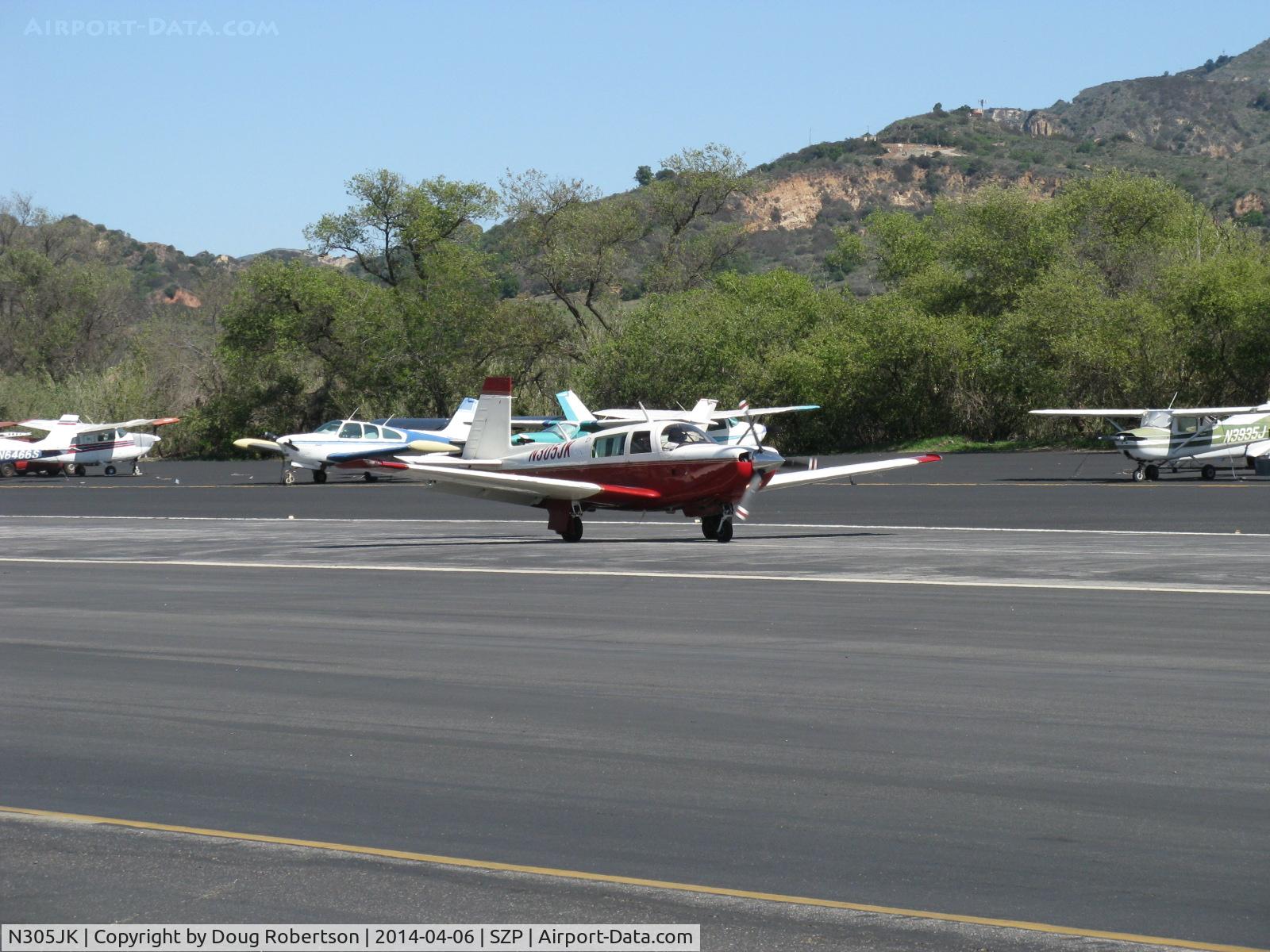 N305JK, 1979 Mooney M20K C/N 25-0214, 1979 Mooney M20K 231, Continental 6 cylinder TSIO-360-GB 210 Hp with Rajay turbocharger, fixed wastegate, 1st 6 cylinder Mooney, curved wingtips, dorsal fin airscoop, landing roll Rwy 22