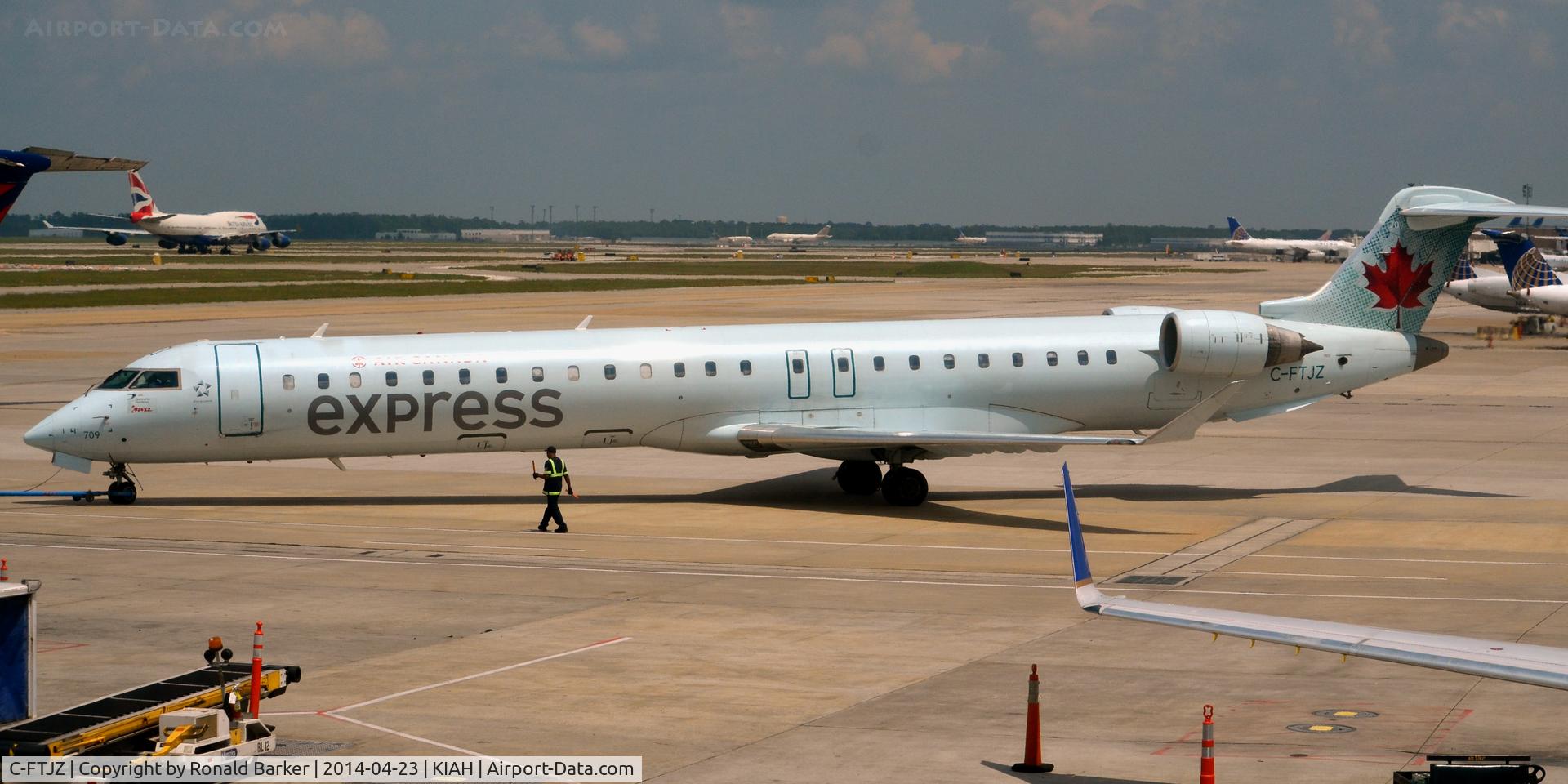 C-FTJZ, 2005 Canadair CRJ-705ER (CL-600-2D15) Regional Jet C/N 15047, Push back Houston