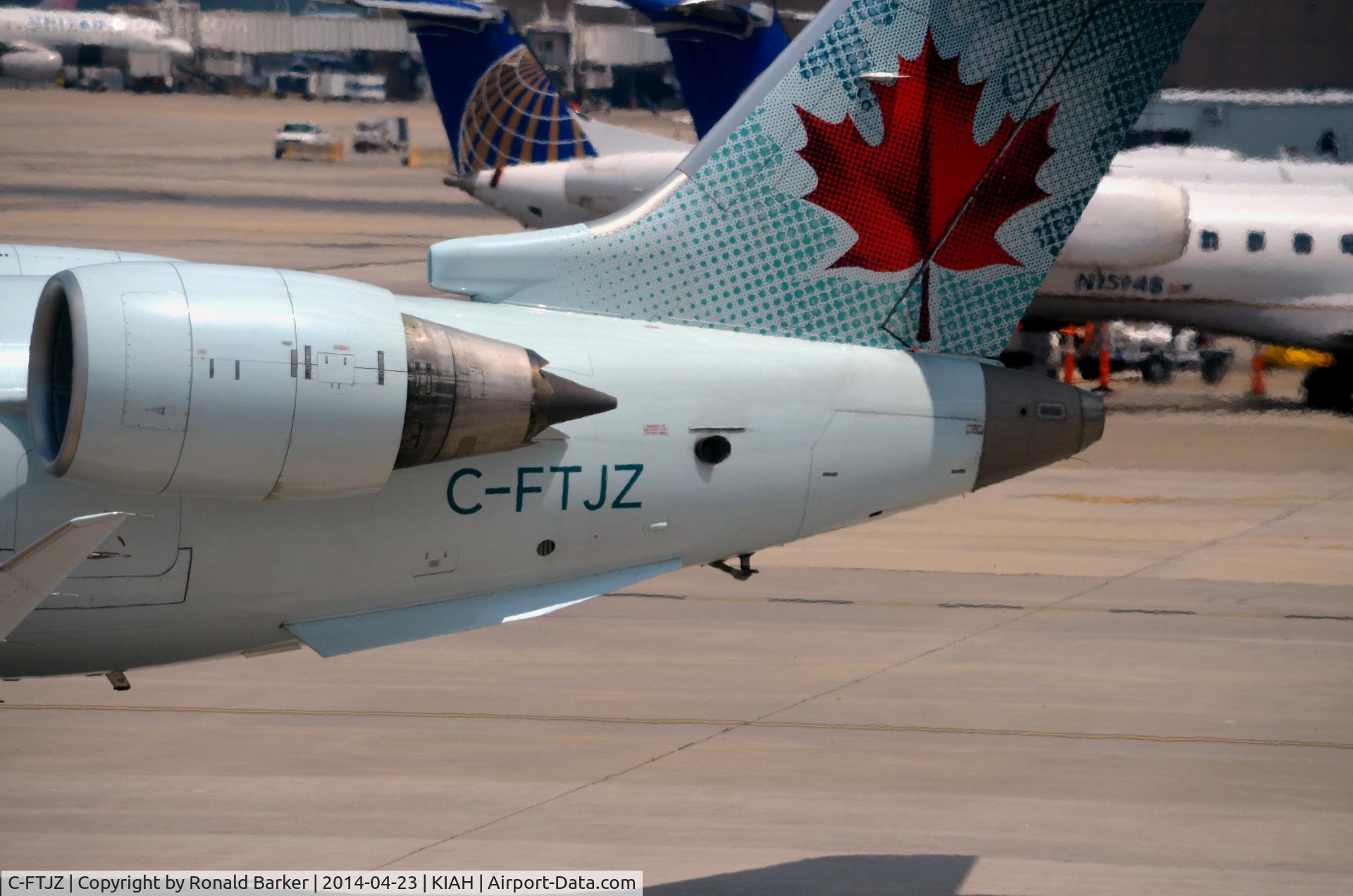 C-FTJZ, 2005 Canadair CRJ-705ER (CL-600-2D15) Regional Jet C/N 15047, Maple Leaf and engine Houston