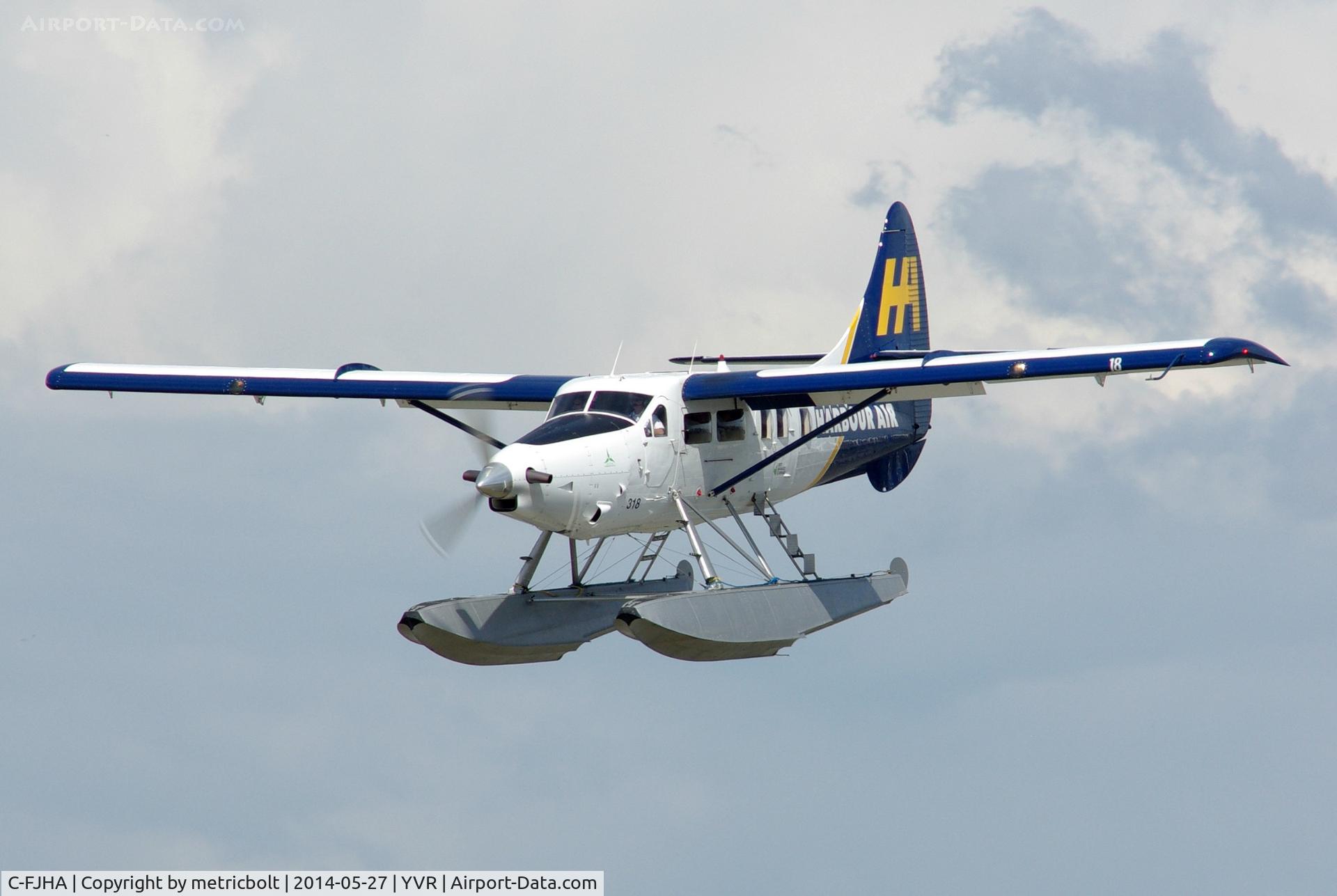C-FJHA, 1960 De Havilland Canada DHC-3 Turbo Otter Otter C/N 393, In its latest colour scheme,landing on the Fraser River