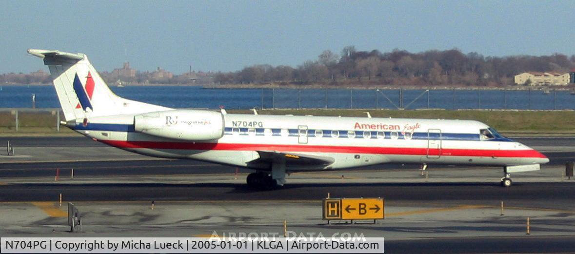 N704PG, 1999 Embraer ERJ-135LR (EMB-135LR) C/N 145174, At La Guardia