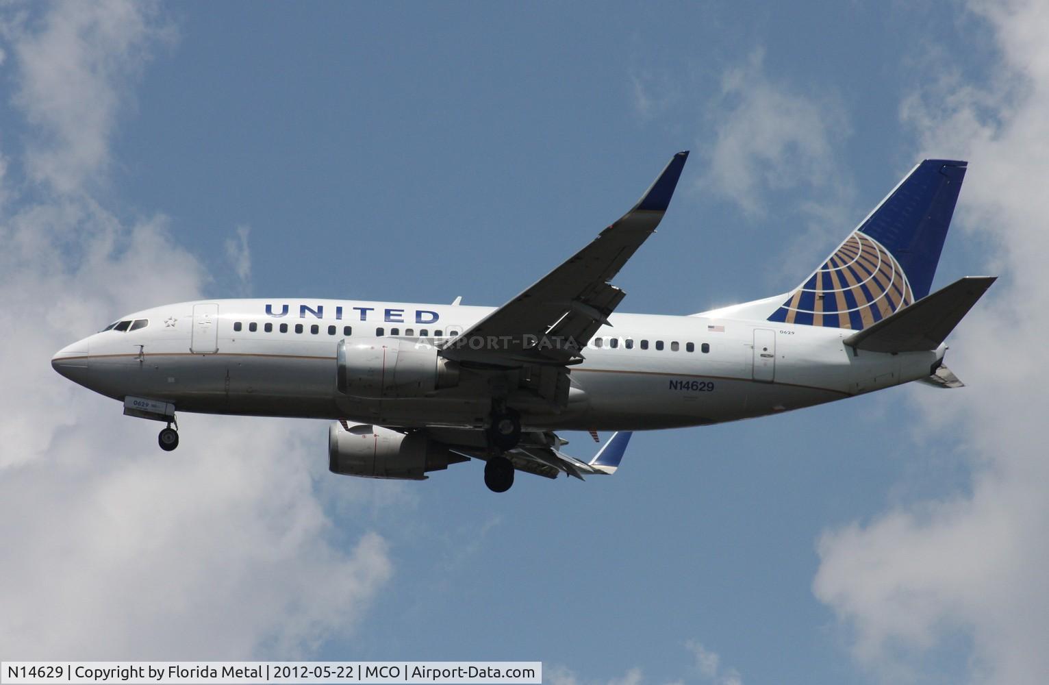 N14629, 1995 Boeing 737-524 C/N 27533, United 737-500 (I would check the date of build that Airport-data has listed though? 1965?)