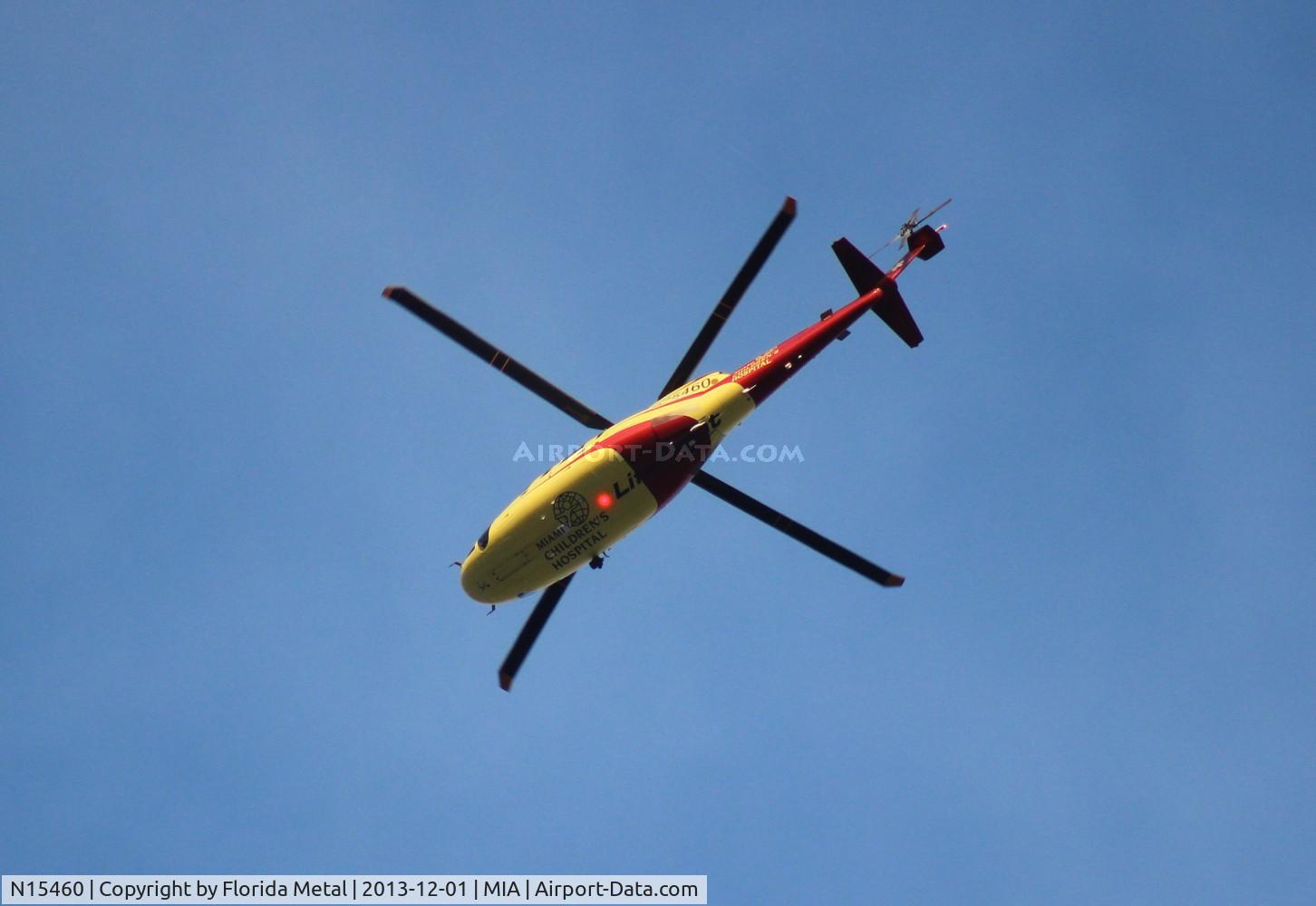 N15460, 1997 Sikorsky S-76C C/N 760477, Miami Children's Hospital S-76C flying over Miami Airport
