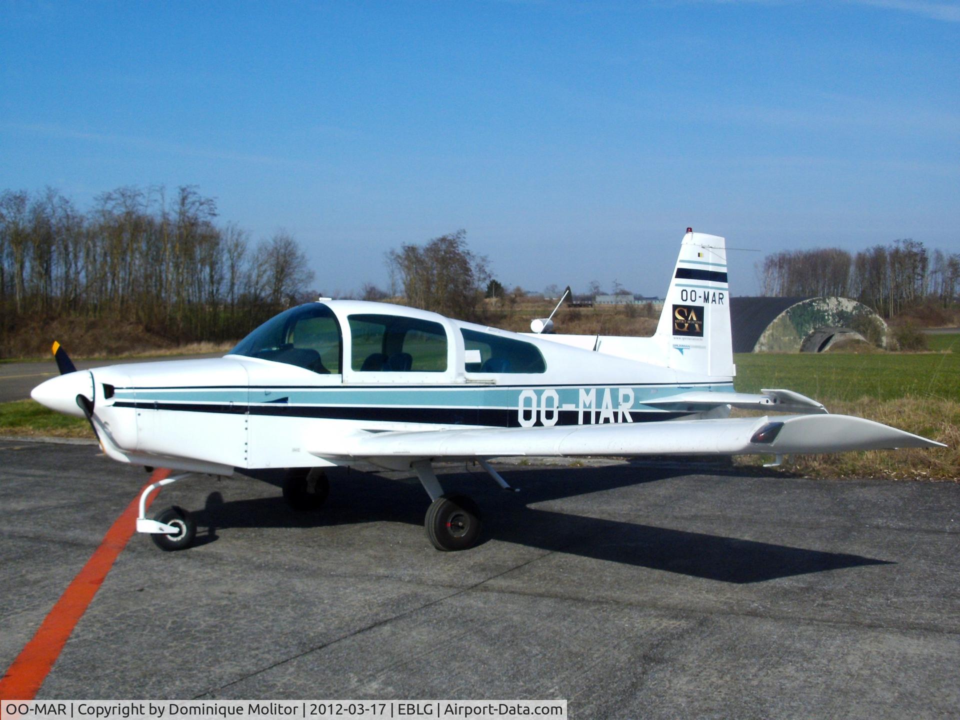 OO-MAR, 1973 Grumman American AA-5 Traveler C/N AA5-0424, Aircraft  parked in front of W7 hangar ( former Bierset  Airbase military side)  shortly after the aircraft was definitely transferred from Brustem ( EBST ) in January 2012.