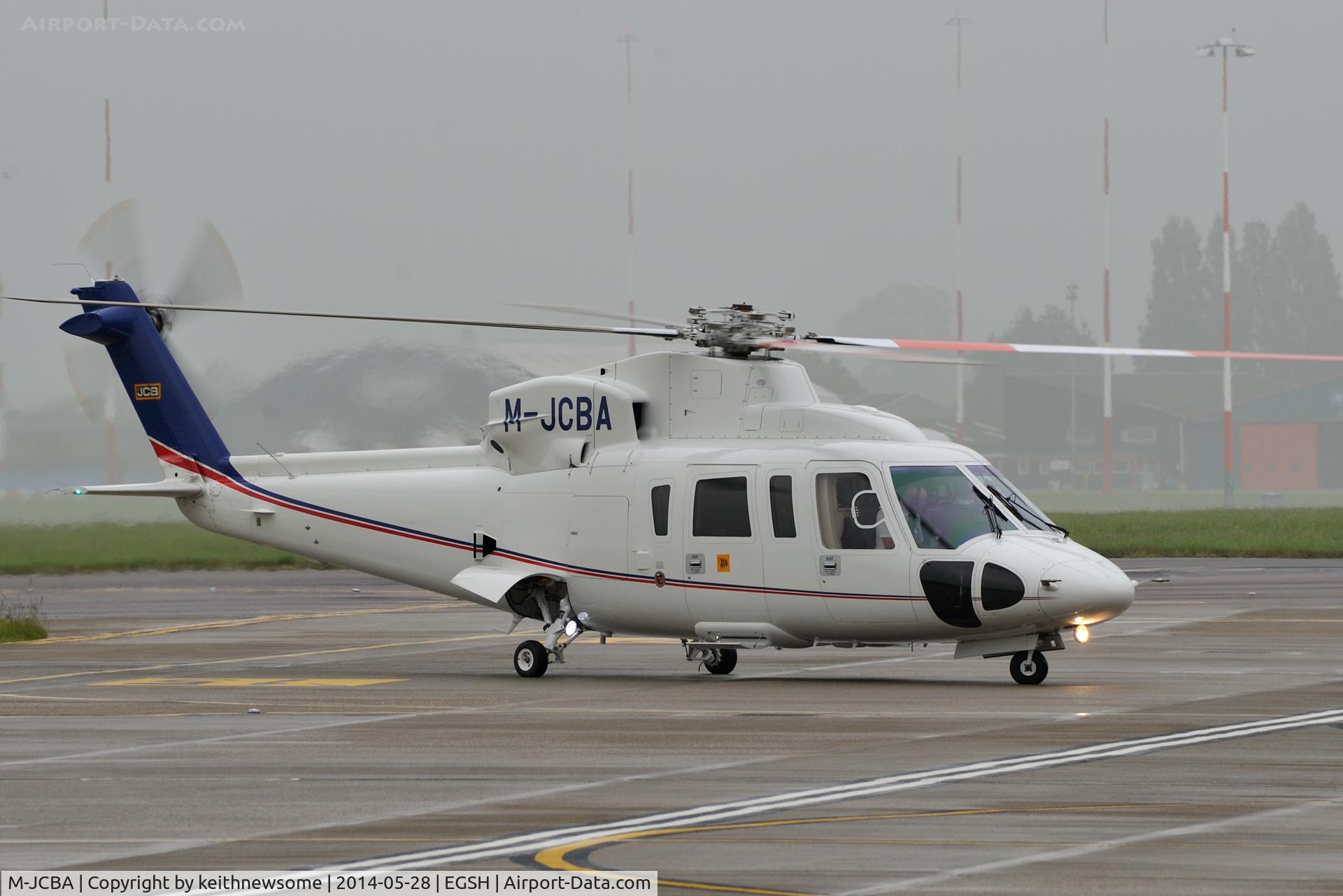 M-JCBA, 2011 Sikorsky S-76C C/N 760807, Arriving at wet Norwich.