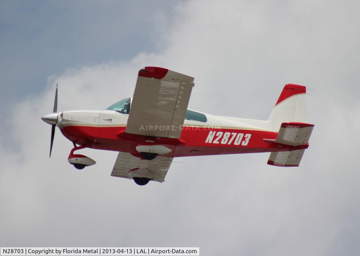 N28703, 1978 Grumman American AA-5B Tiger C/N AA5B0765, Grumman AA-5B leaving Sun N Fun