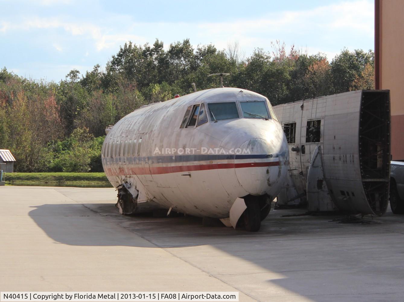N40415, 1952 Martin 404 C/N 14119, Martin 404 fuselage in the back lots of Fantasy of Flight
